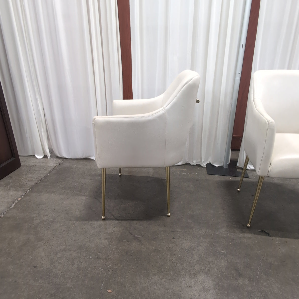 Pair of Antropologie Off-White Upholstered Arm Chair with Tapered Metal Legs