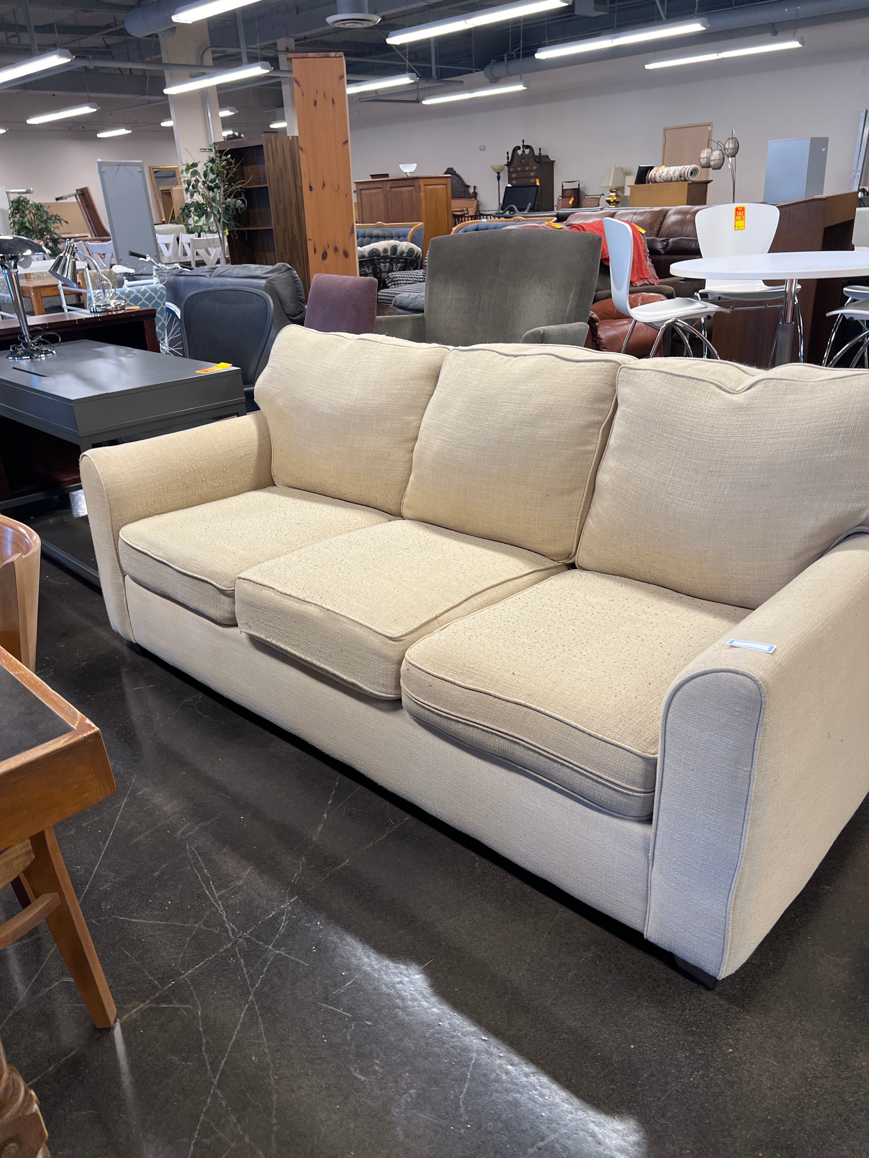 Pilled sofa yellow