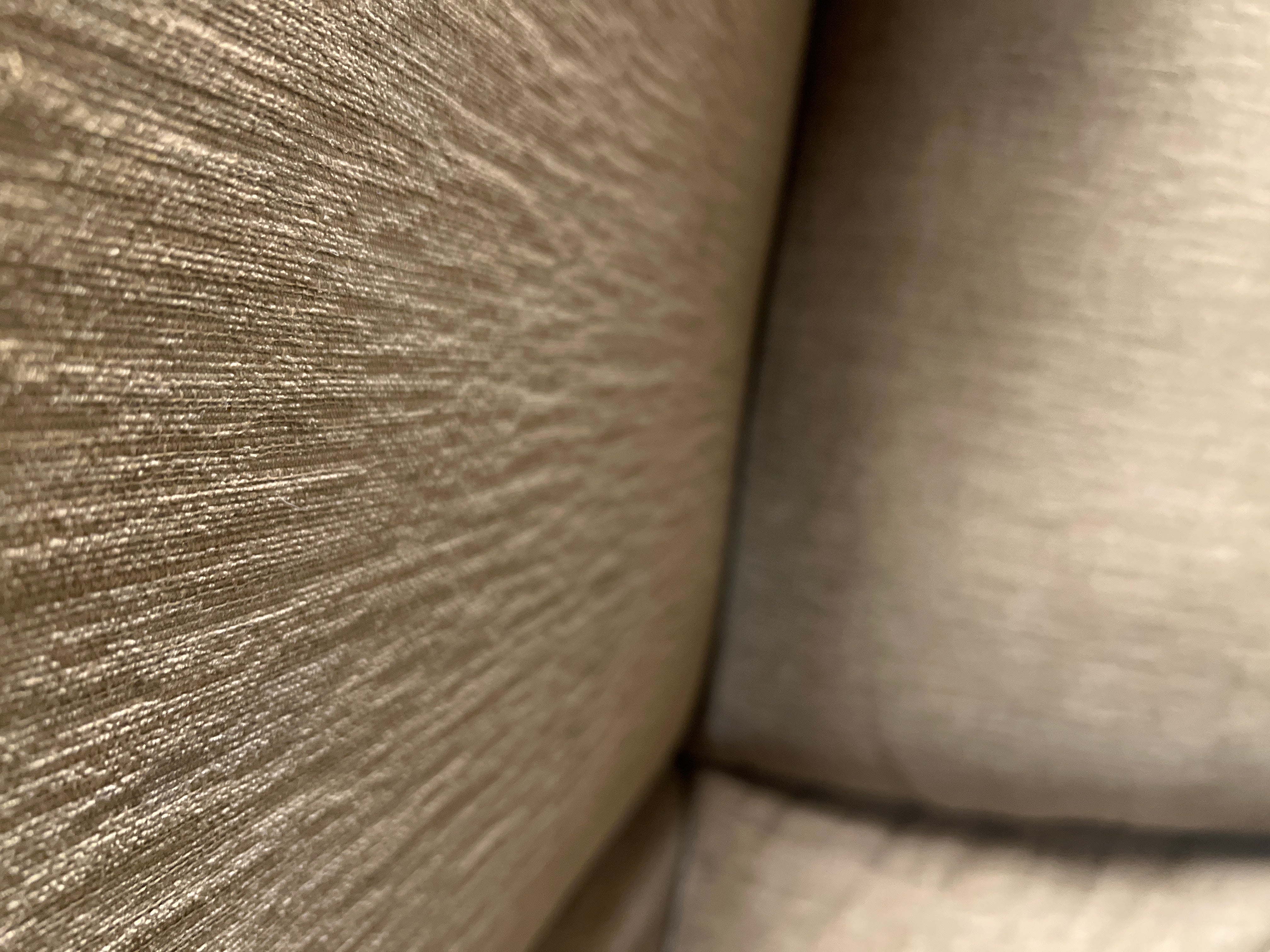 Tan Two Seat Sofa With Two Cushions - Rip in Upper Part of Couch - Price Reflects Damage