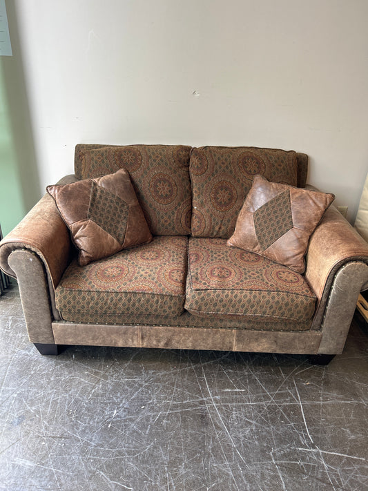 Brown and Rust Pattern Loveseat with Leather Accent
