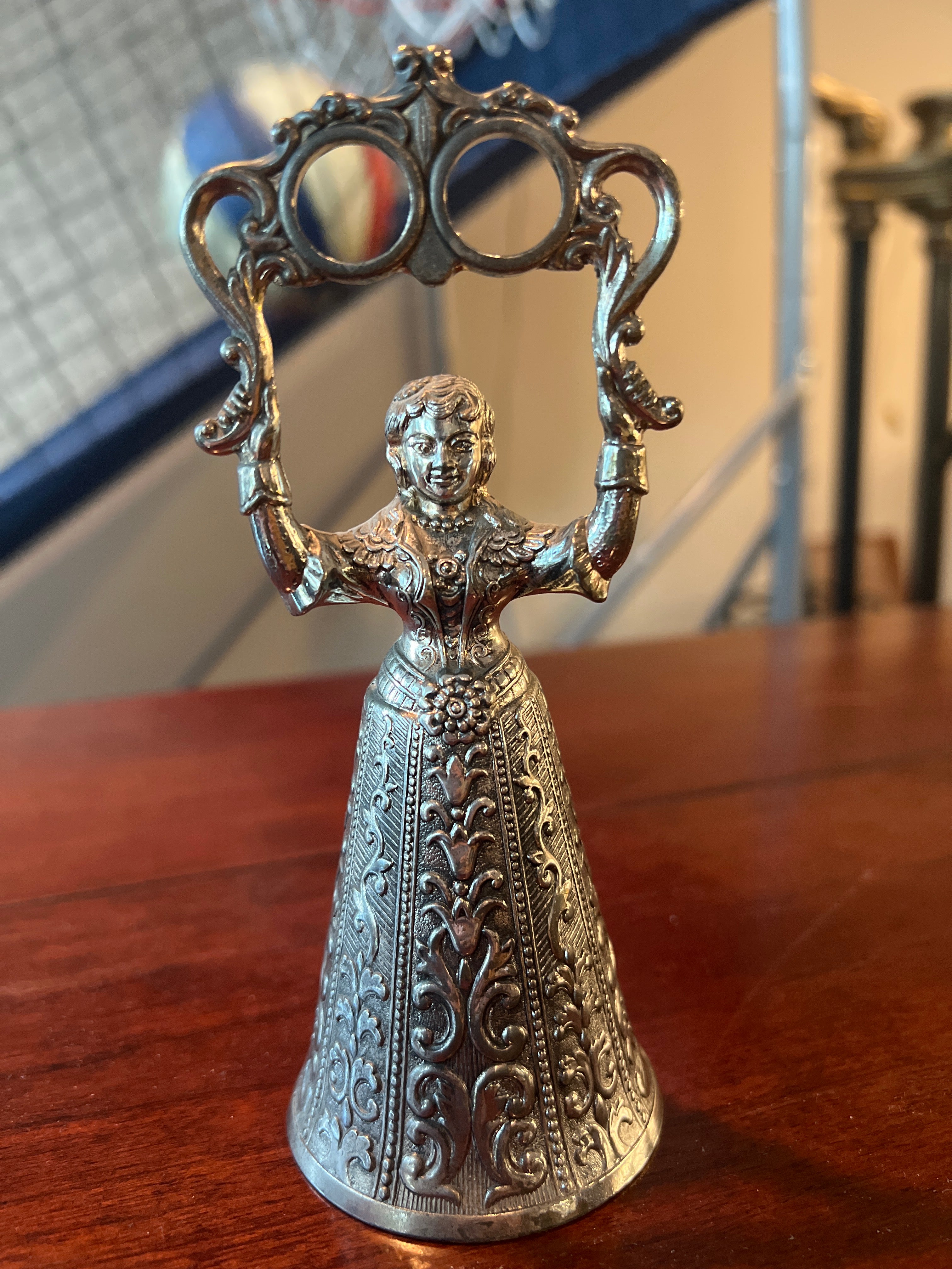 Ornate Metallic Decorative Bell with Sculpted Base