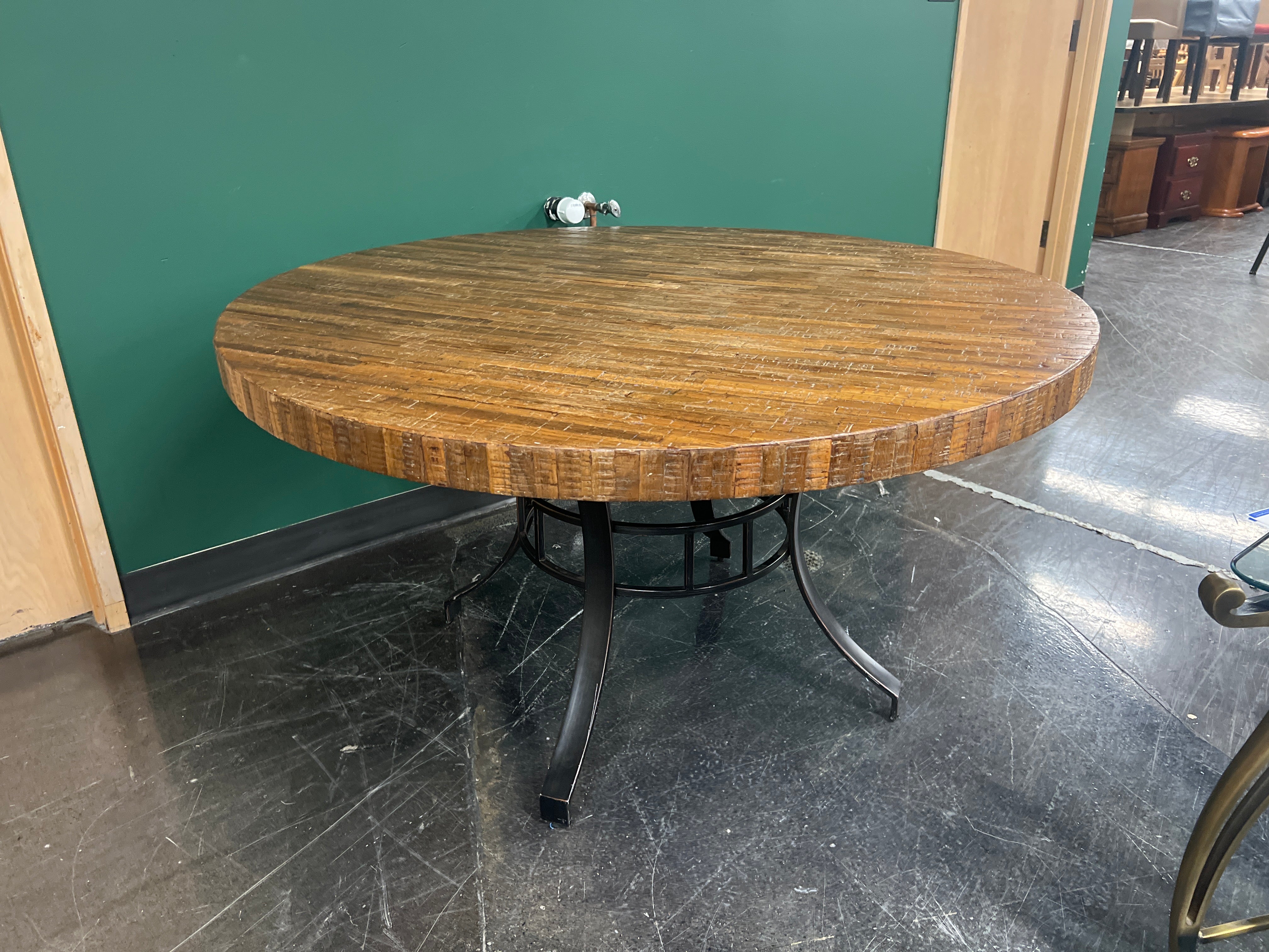 Rustic Round Wood Plank Dining Table with Industrial Metal Base