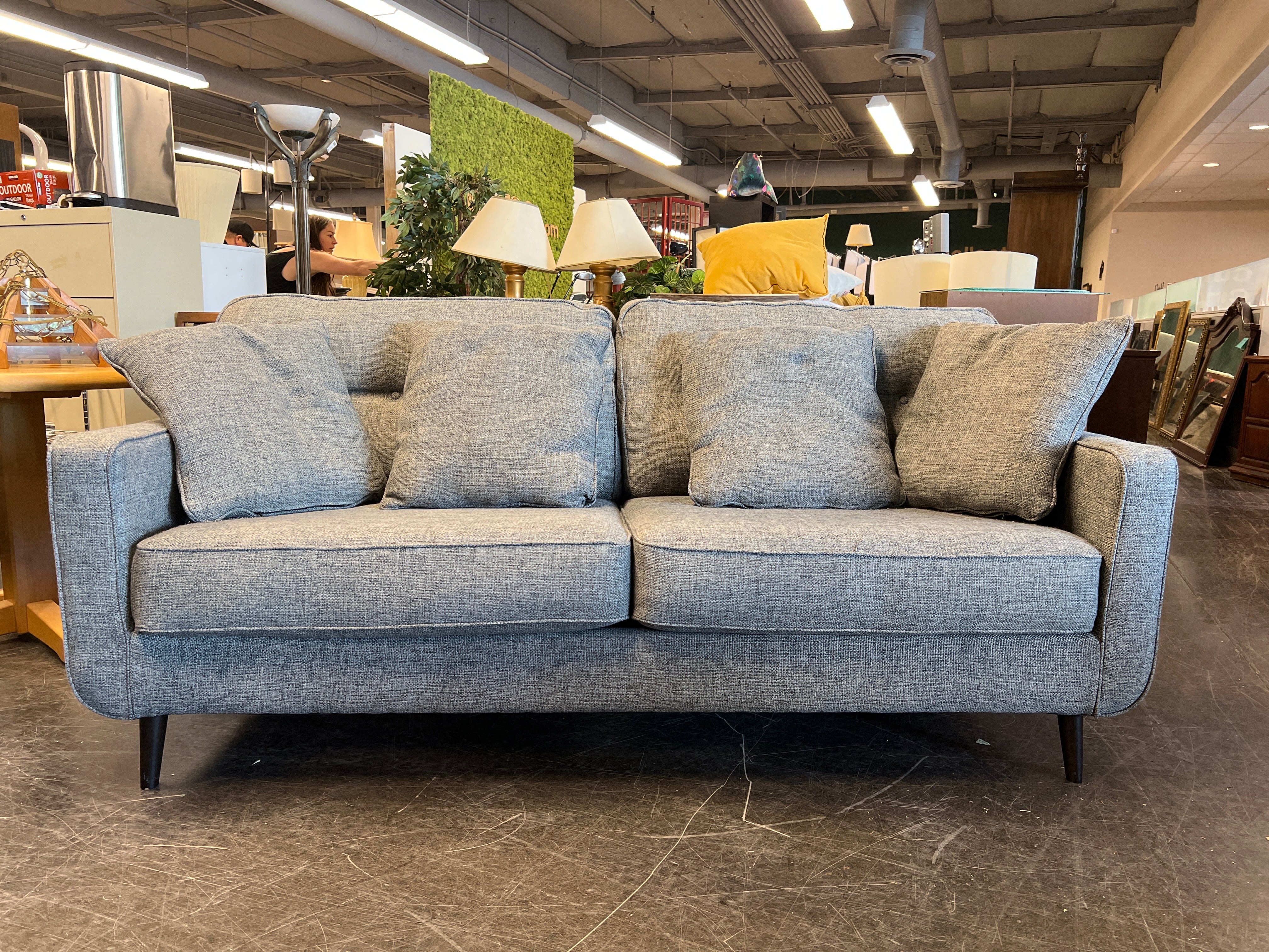 Large Gray Sofa with Tufted Back