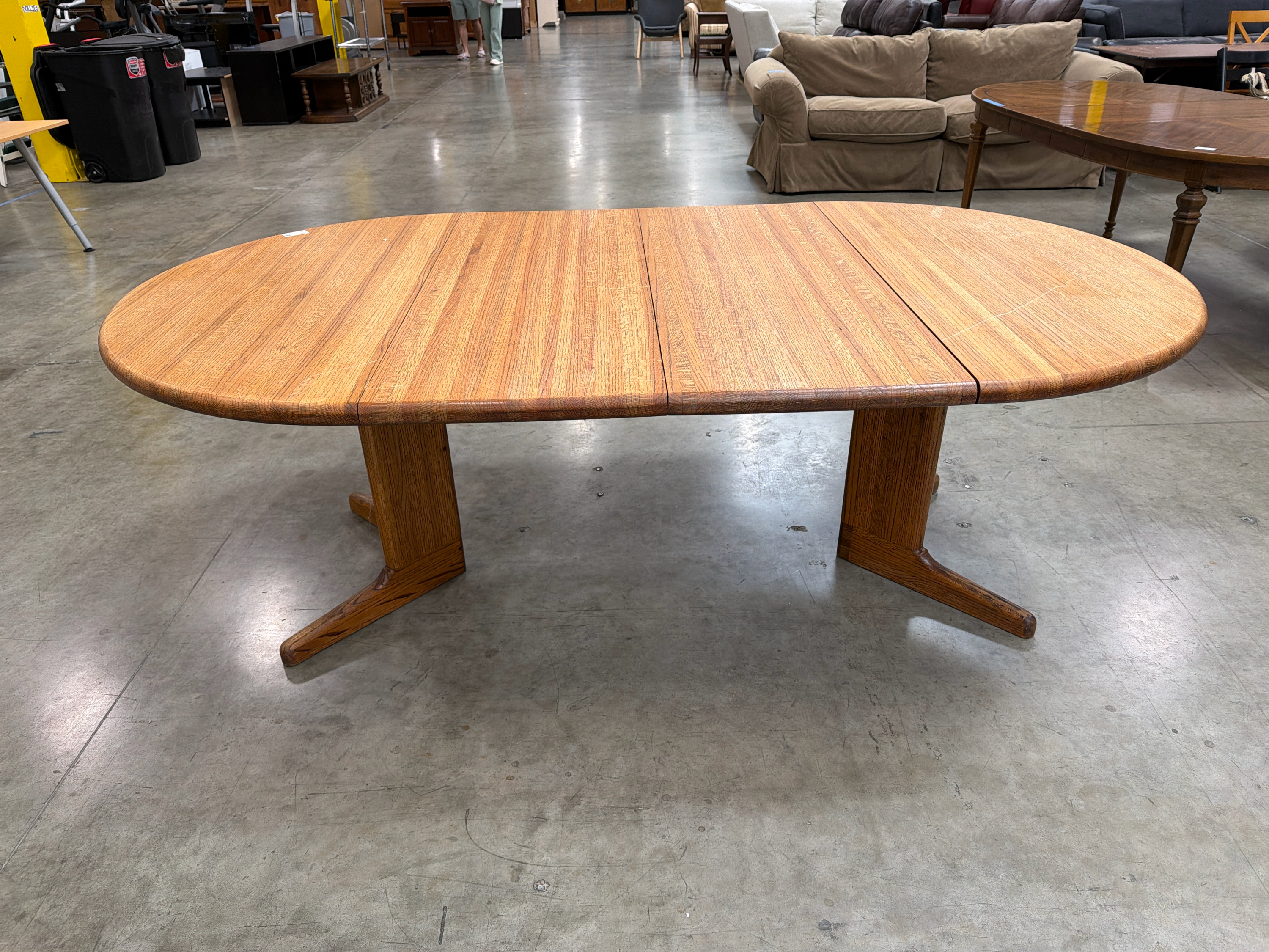 Oval Hardwood Pedestal Dining Table with Extension Leaf