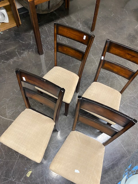 Set of Four Brown Wood Dining Chairs with Beige Cushions