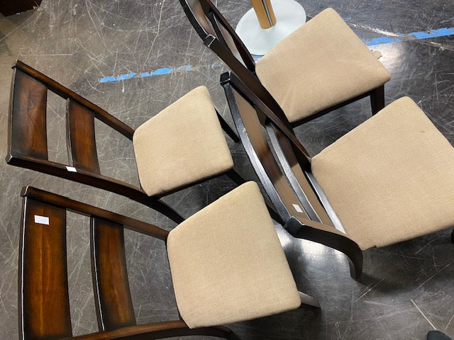 Set of Four Brown Wood Dining Chairs with Beige Cushions