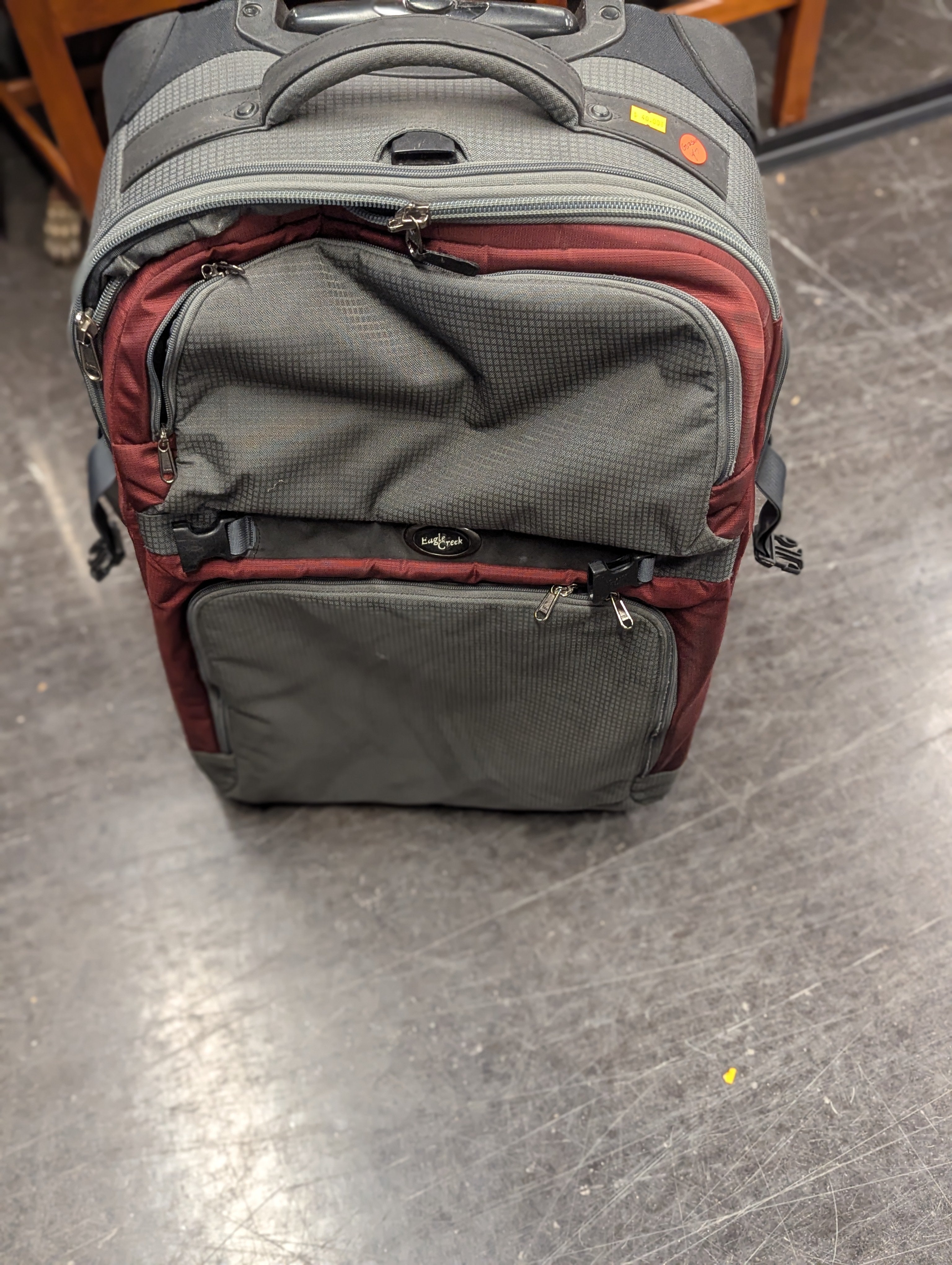 Eagle Creek Grey and Maroon Suitcase