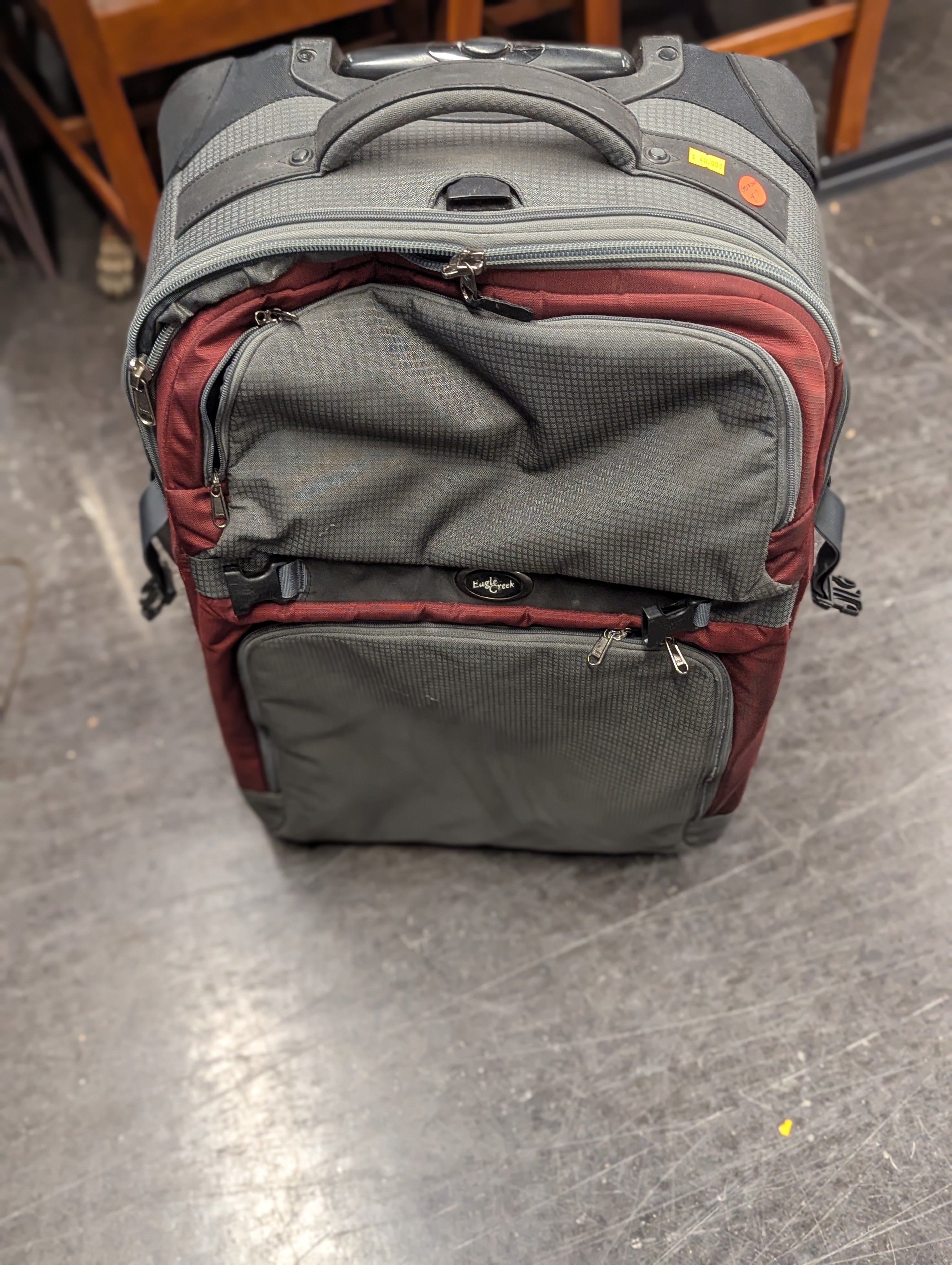 Eagle Creek Grey and Maroon Suitcase