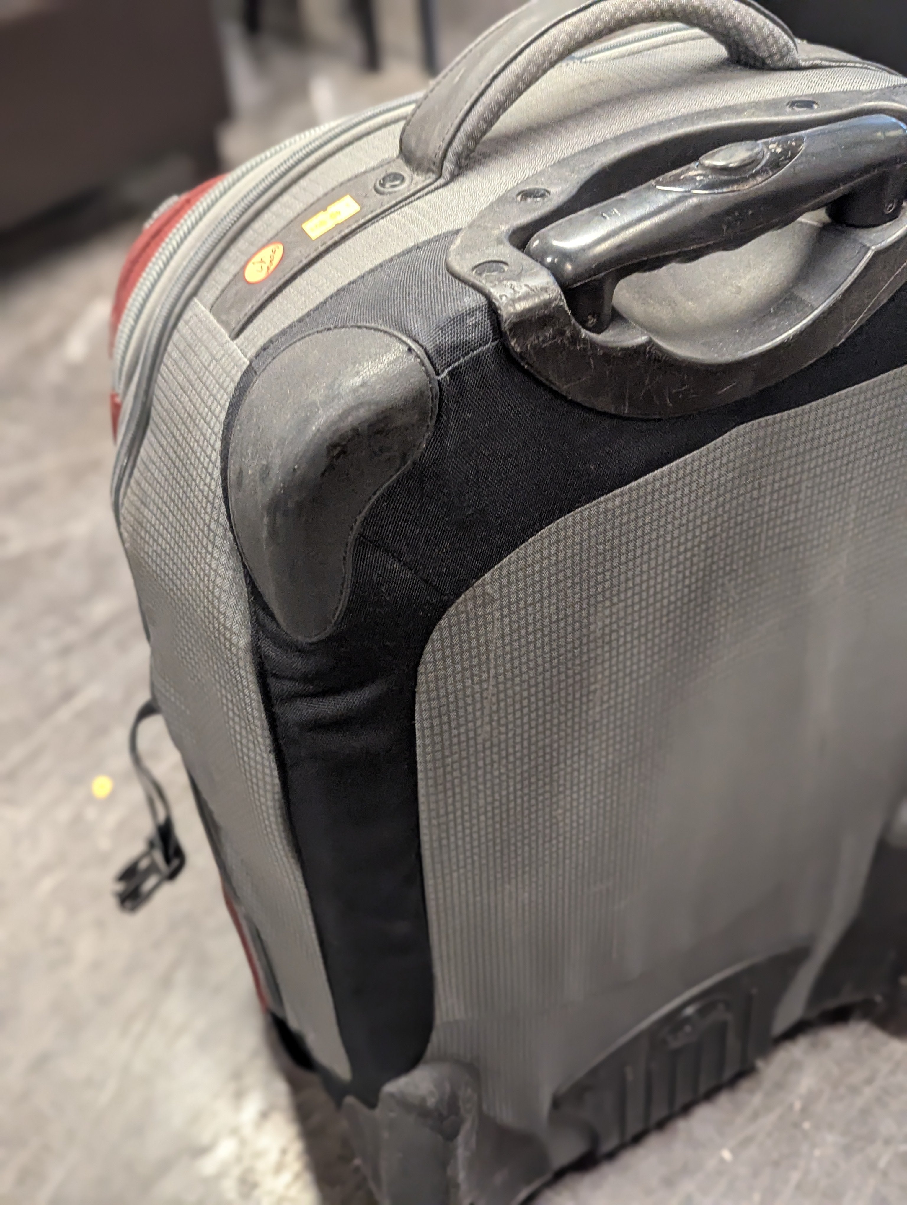 Eagle Creek Grey and Maroon Suitcase