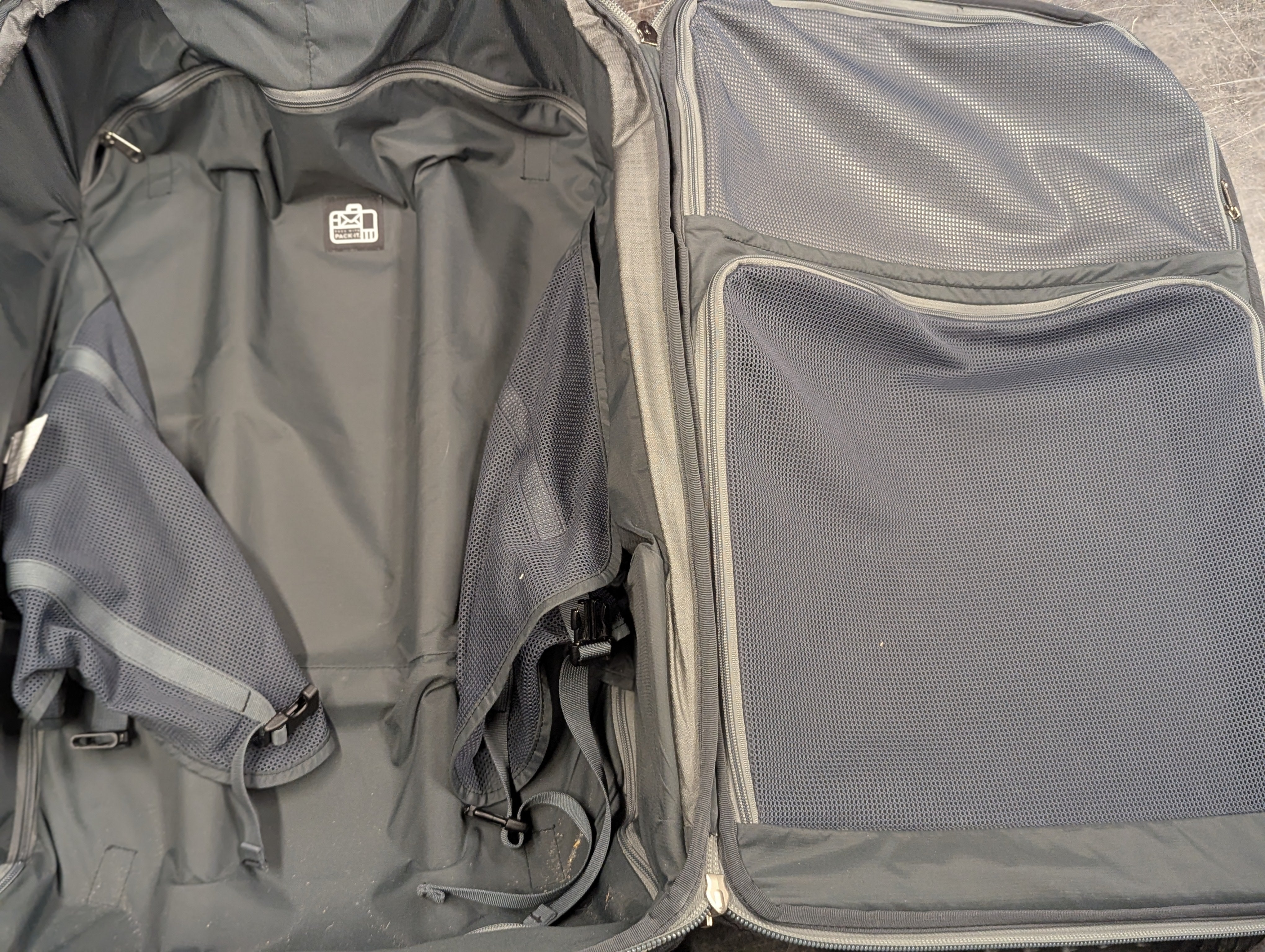 Eagle Creek Grey and Maroon Suitcase