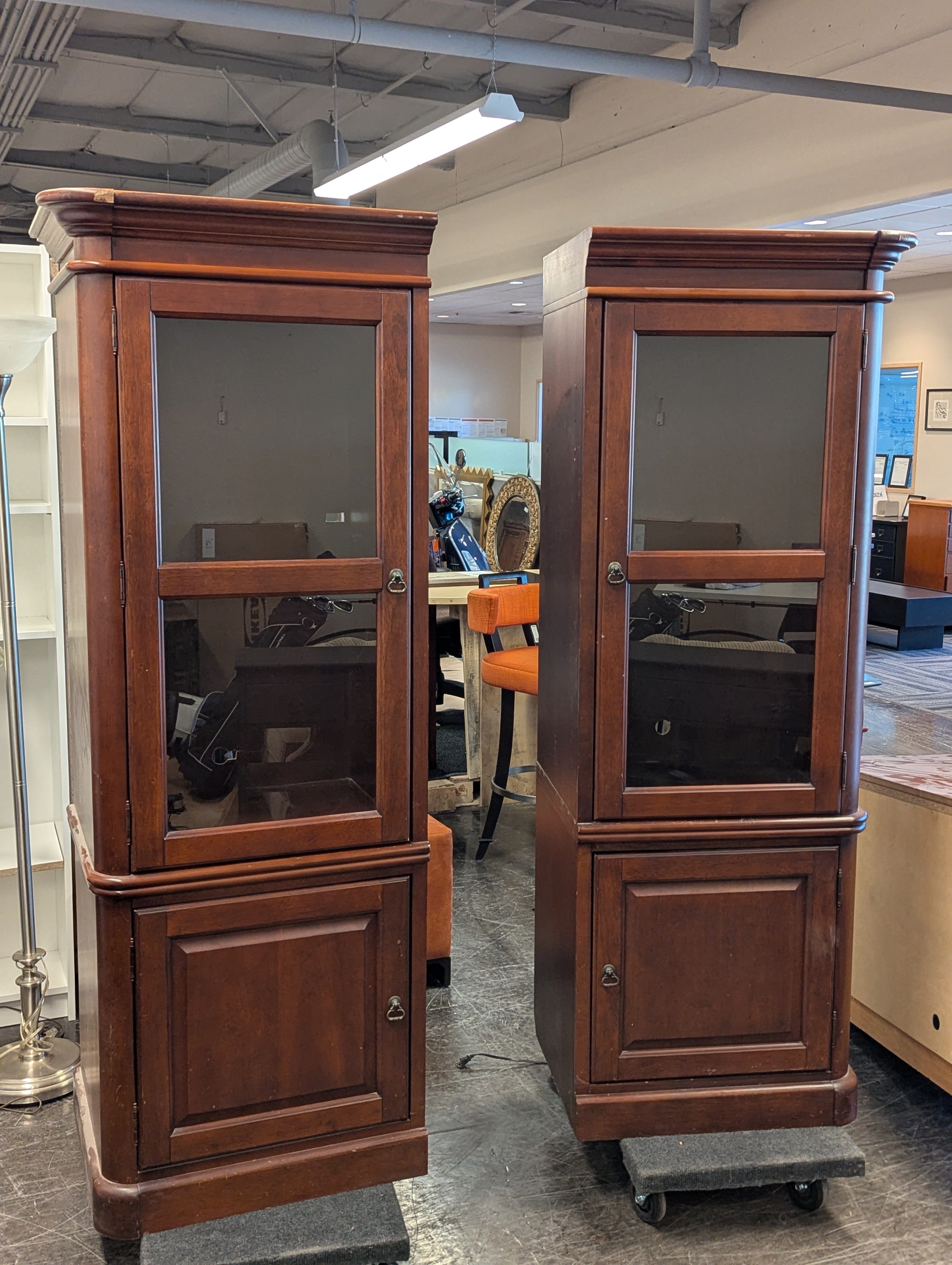 Two Corner Cabinets With Lighting