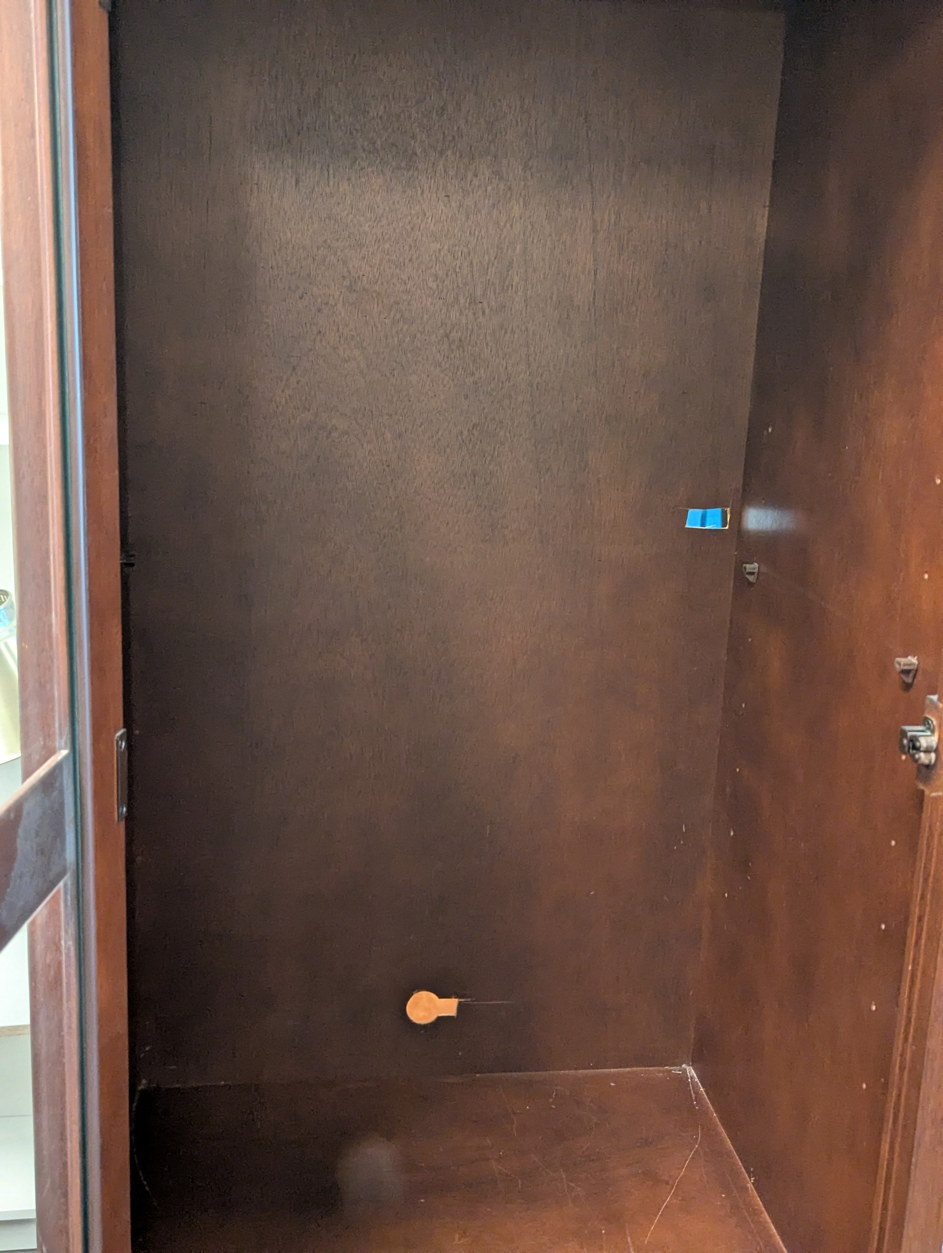 Two Corner Cabinets With Lighting