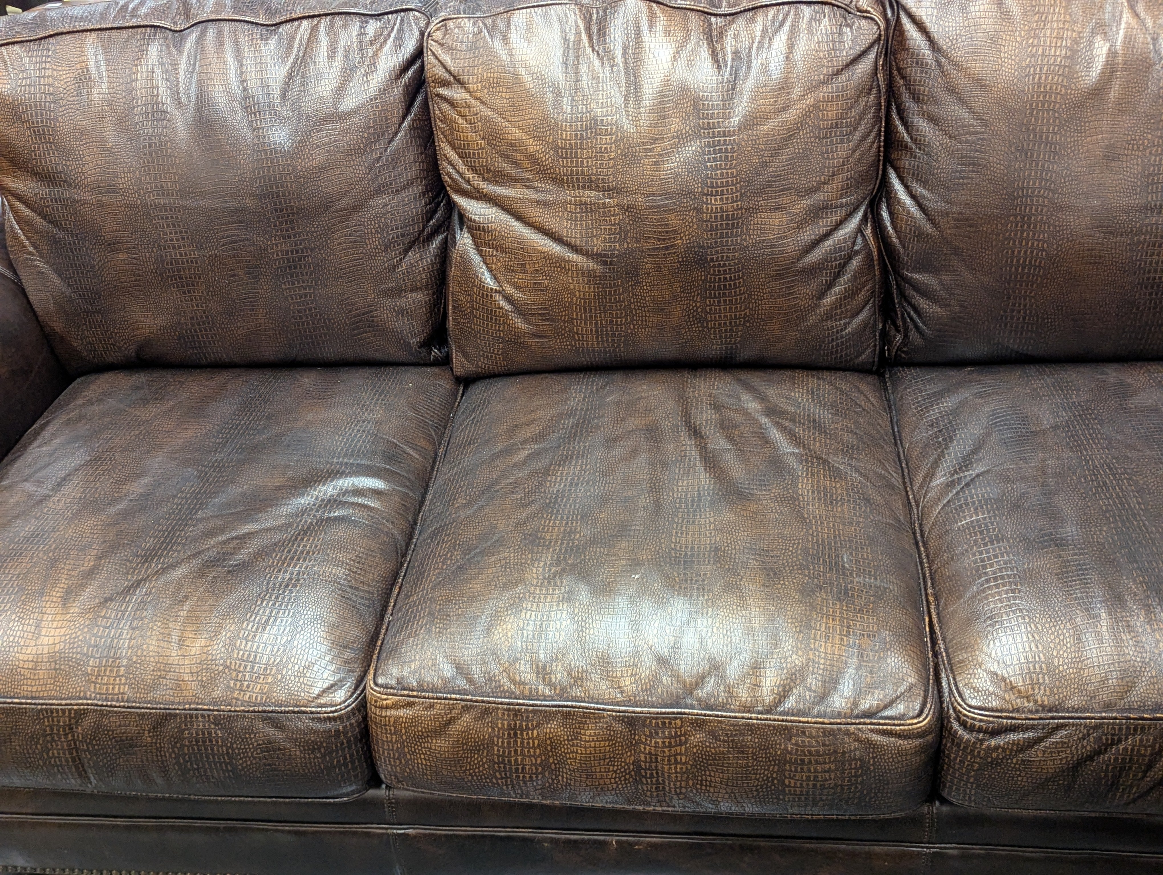 Brown Embossed Leather Couch On Casters