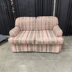 Multi-Color Plaid Rolled Arm Loveseat with Skirted Base