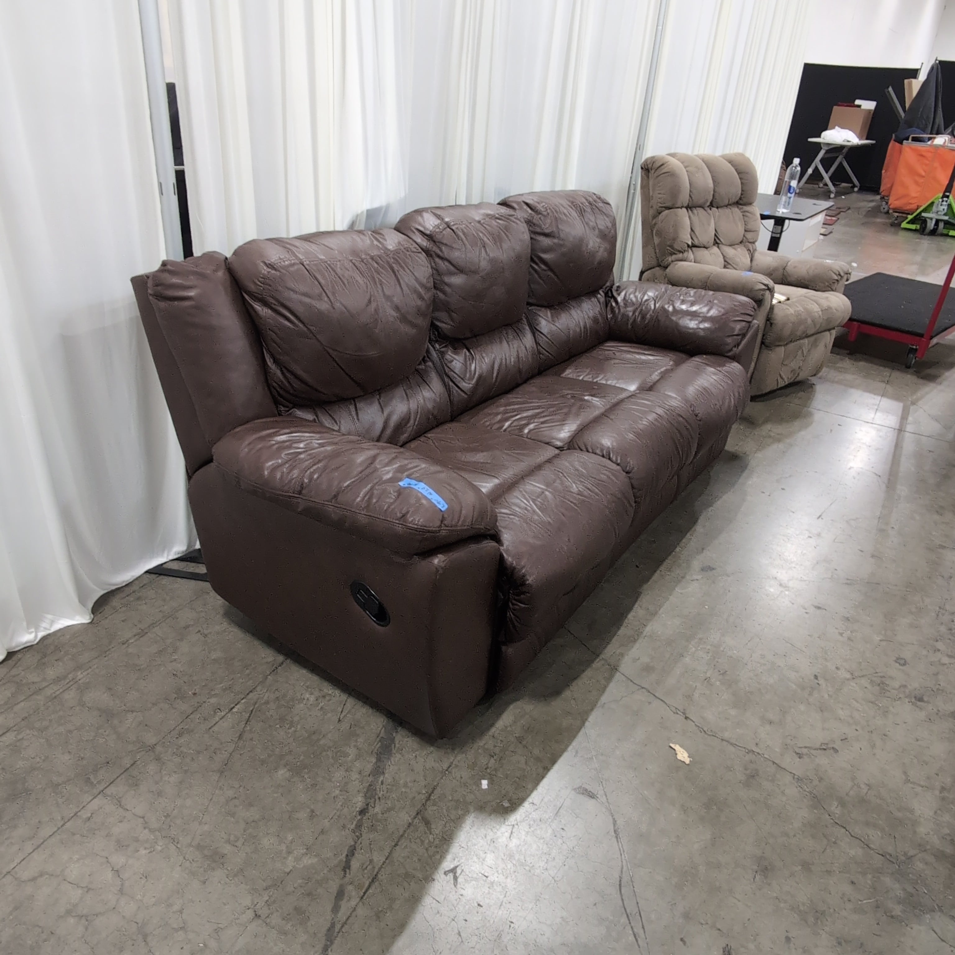 Brown Leather Three-Seat Recliner Couch