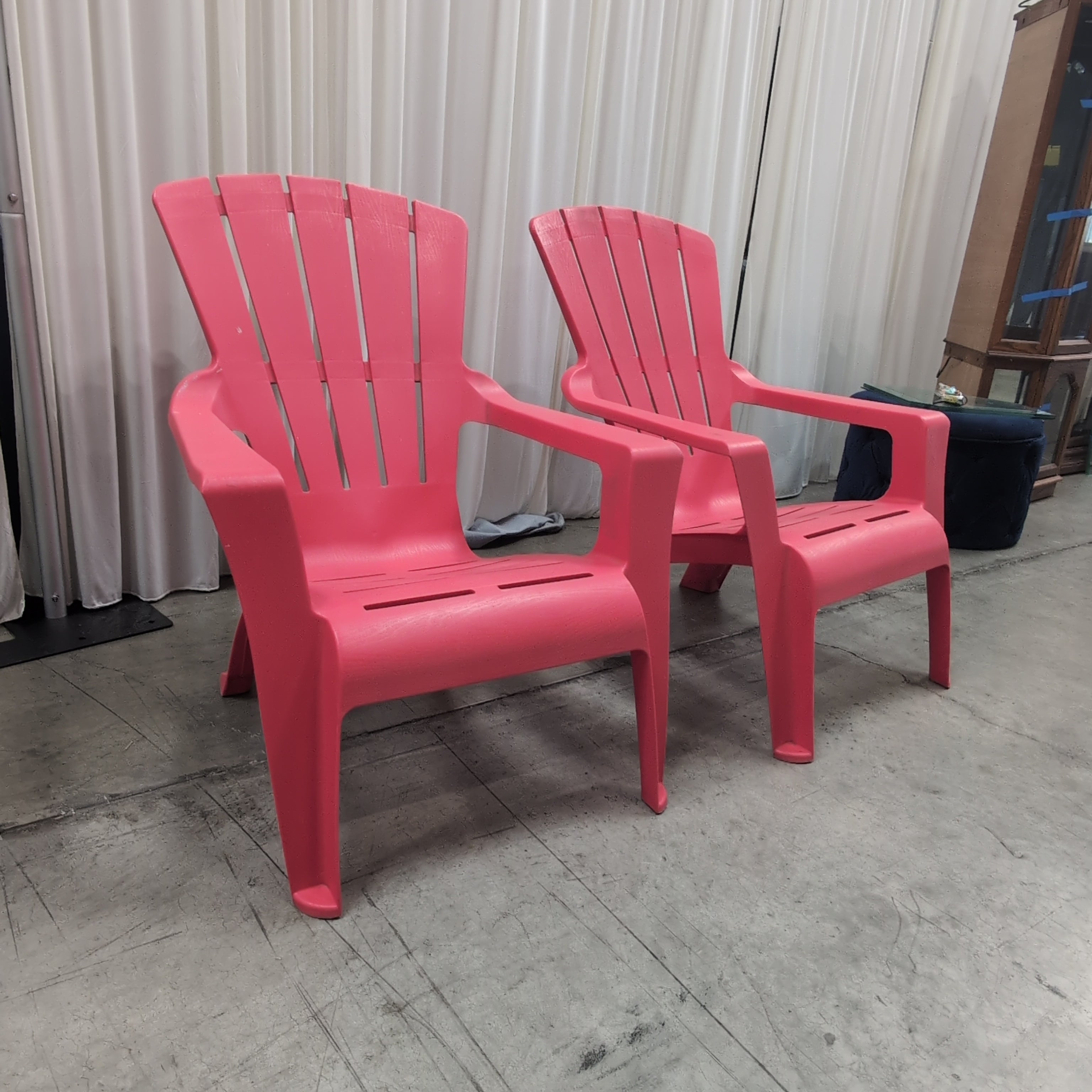 Pair of Red Plastic outdoor chairs