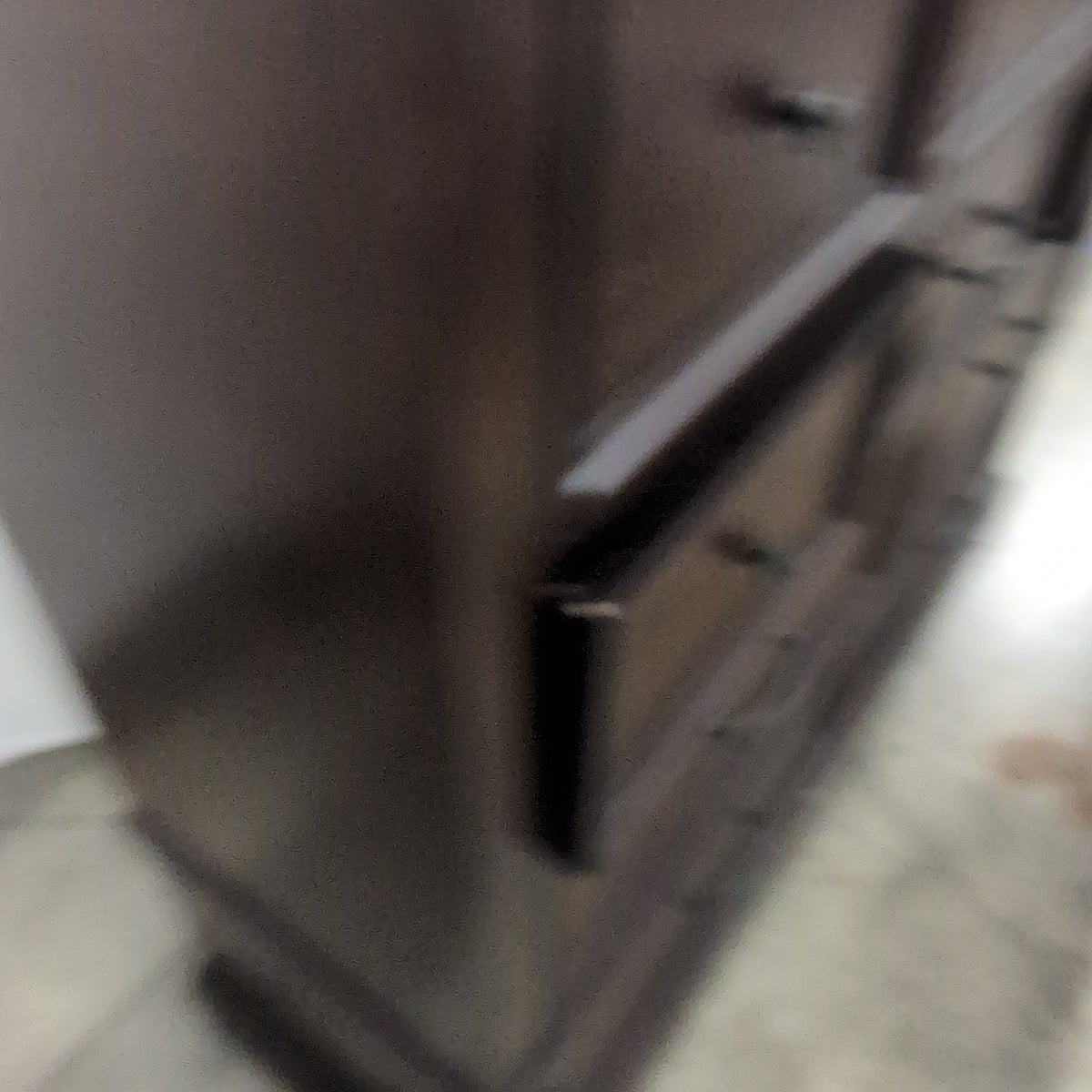 Dark Brown Wood Eight-Drawer Dresser with Ornate Hardware