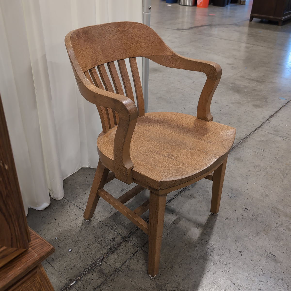 Golden Oak Curved Back Arm Chair with Slatted Spindles
