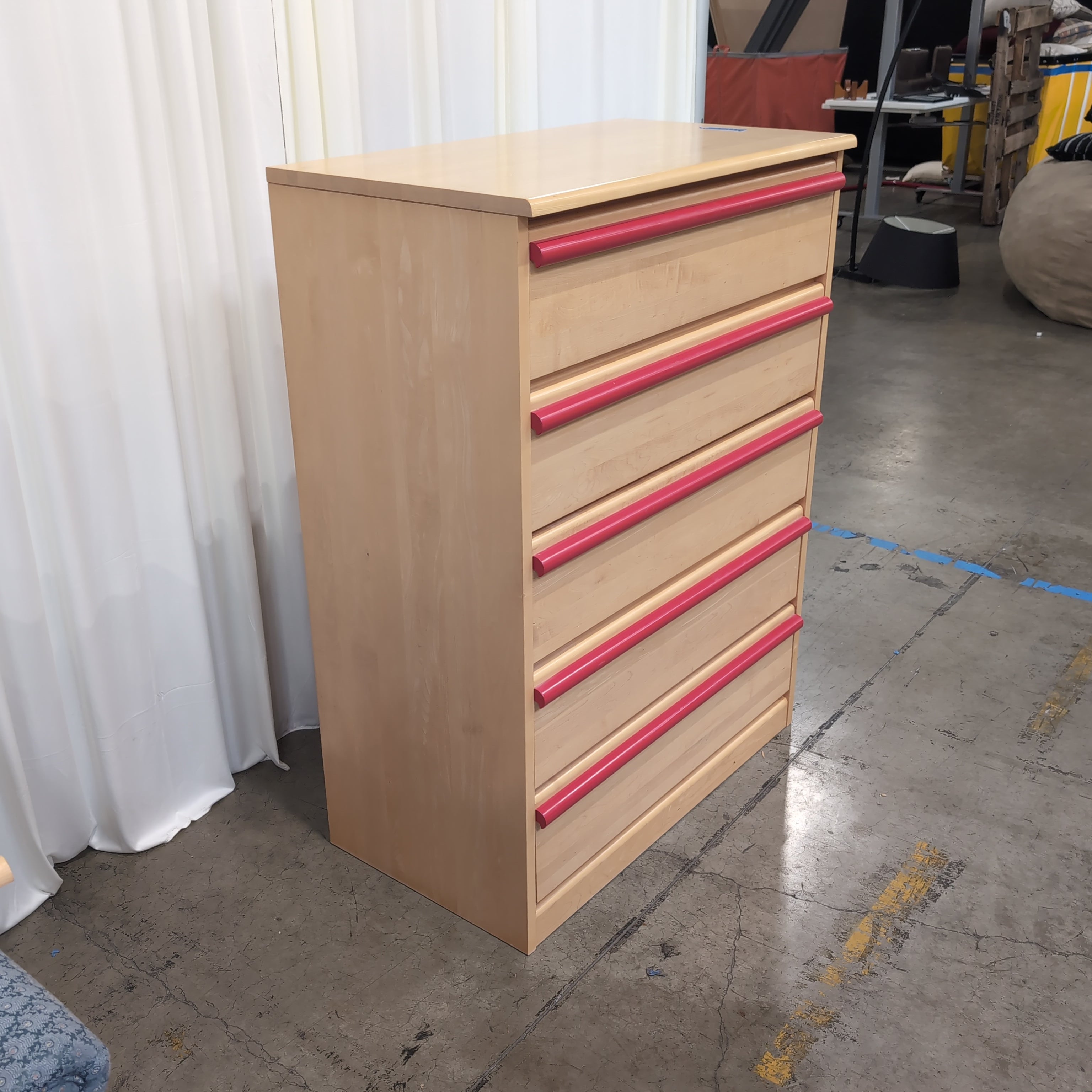 Light Wood Five-Drawer Dresser with Red Handles
