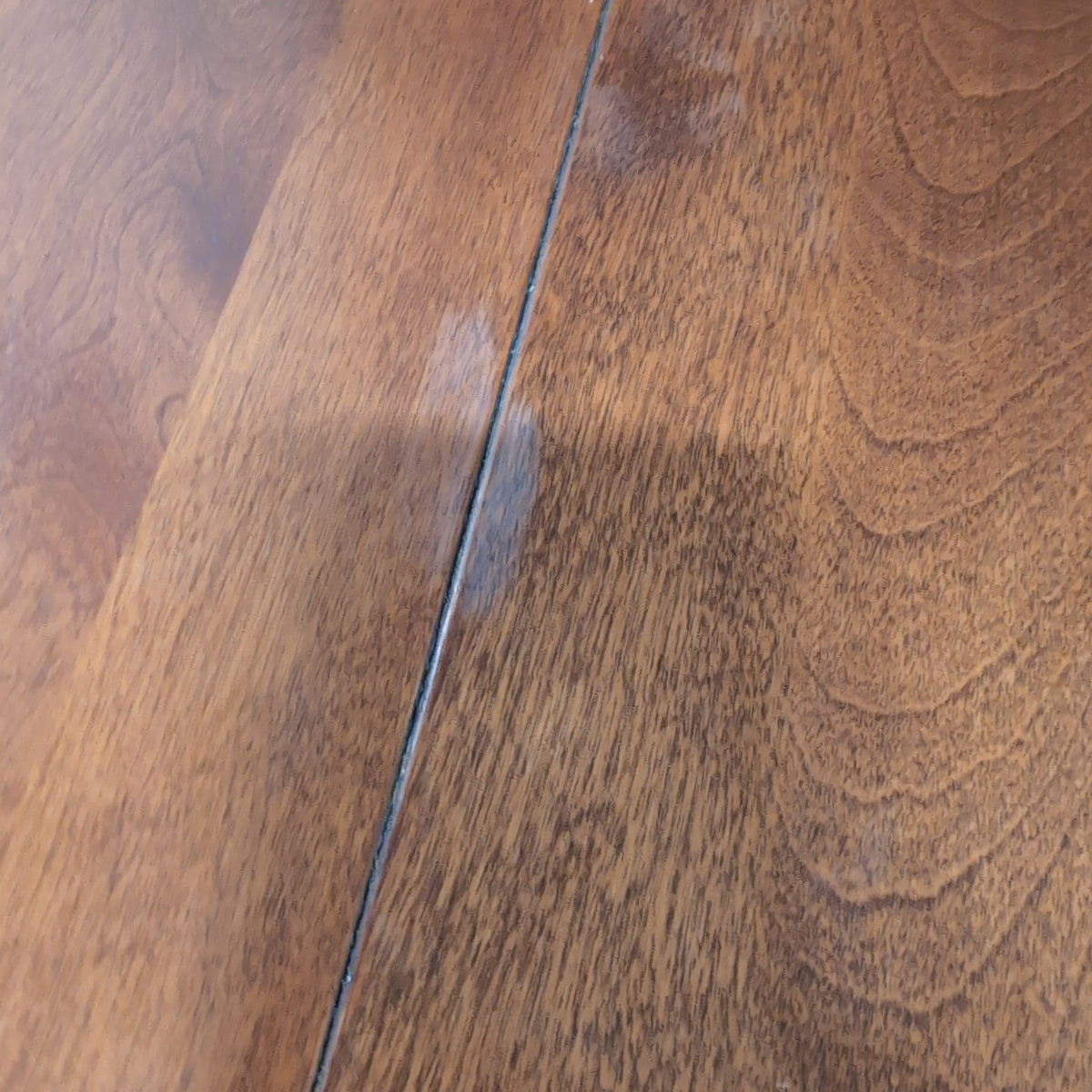 Cherry Tone Oval Wood Dining Table with Center Leaf