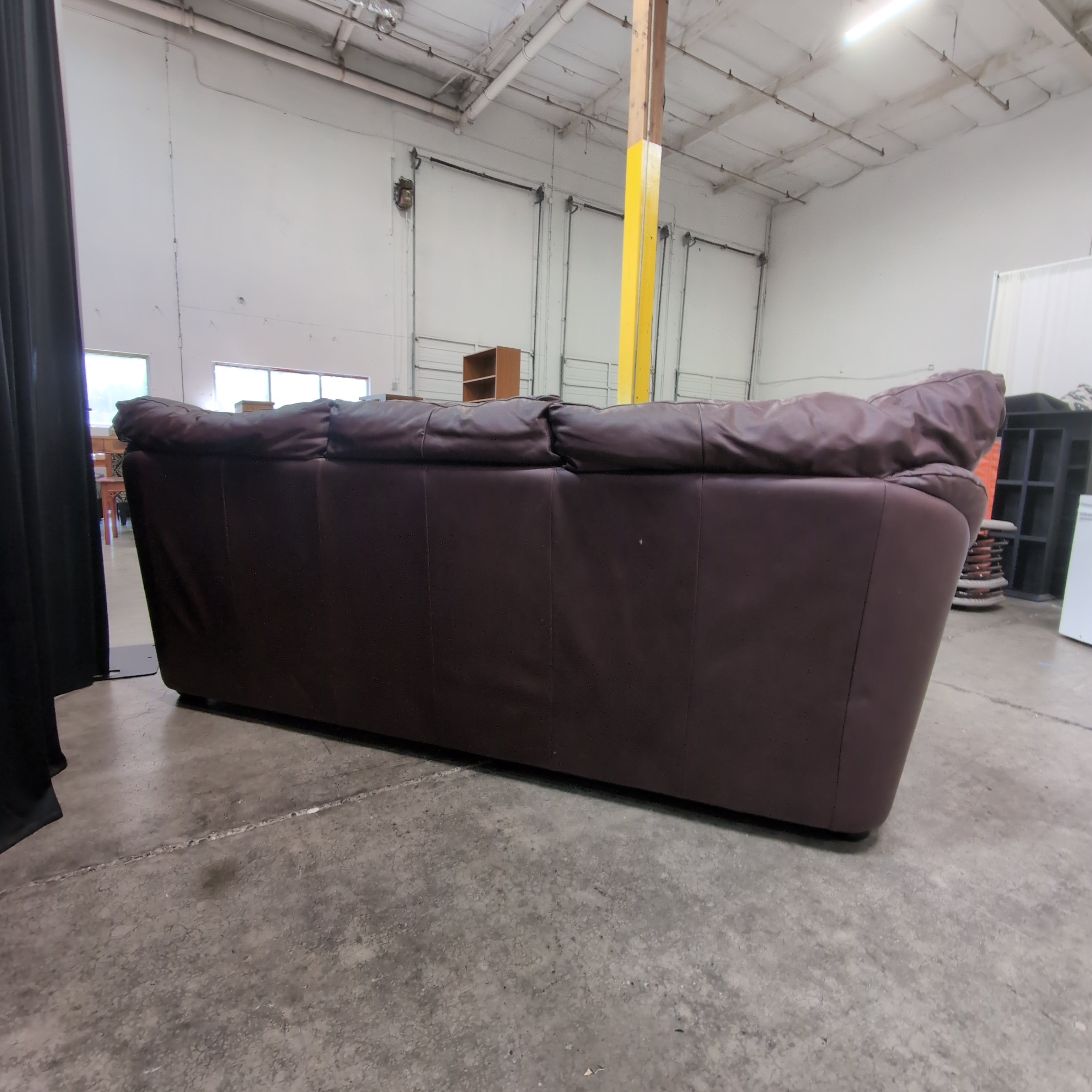 Dark Reddish Brown Three-Cushion Couch