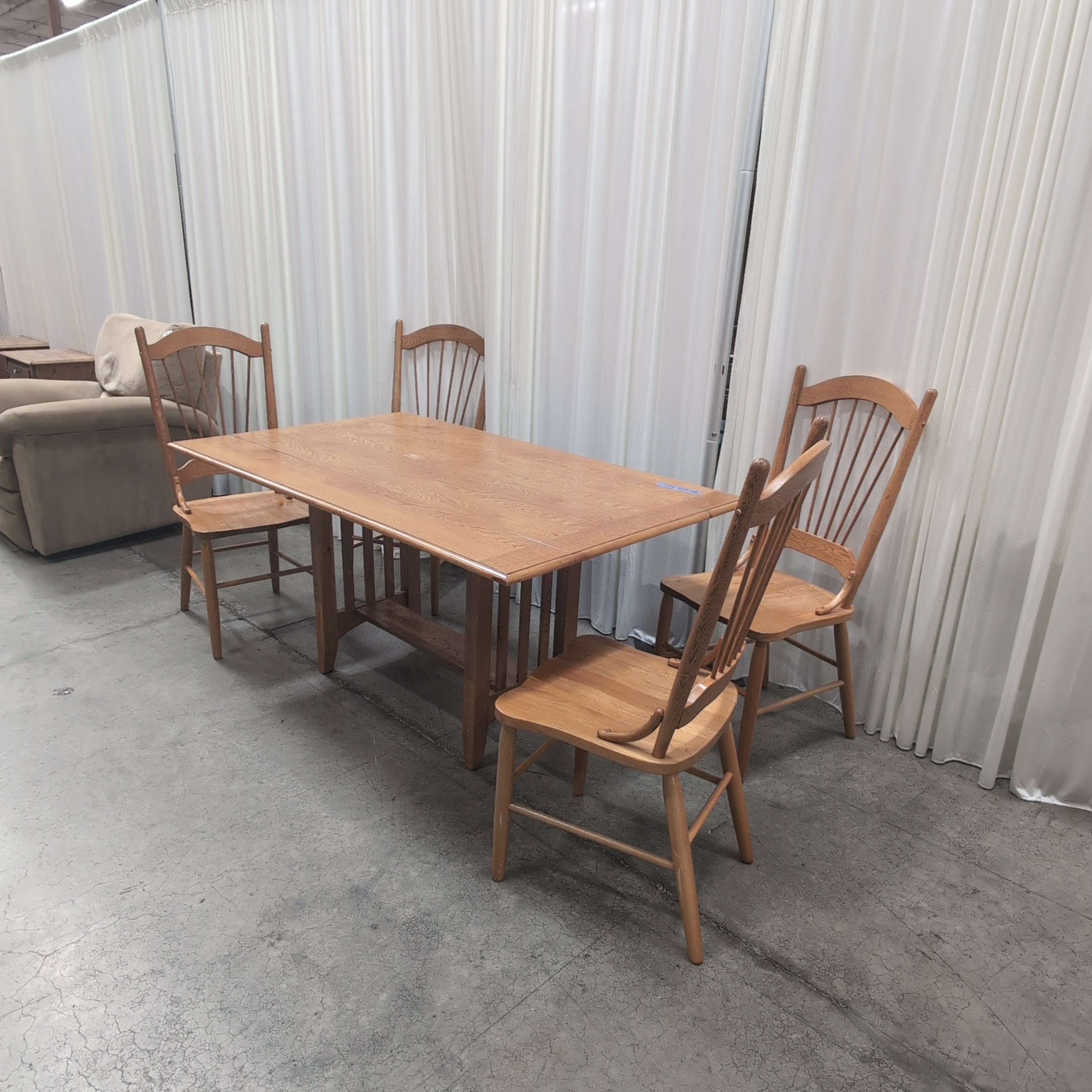 Oak Tone Drop Leaf Dining Table with Spindle Back Chairs
