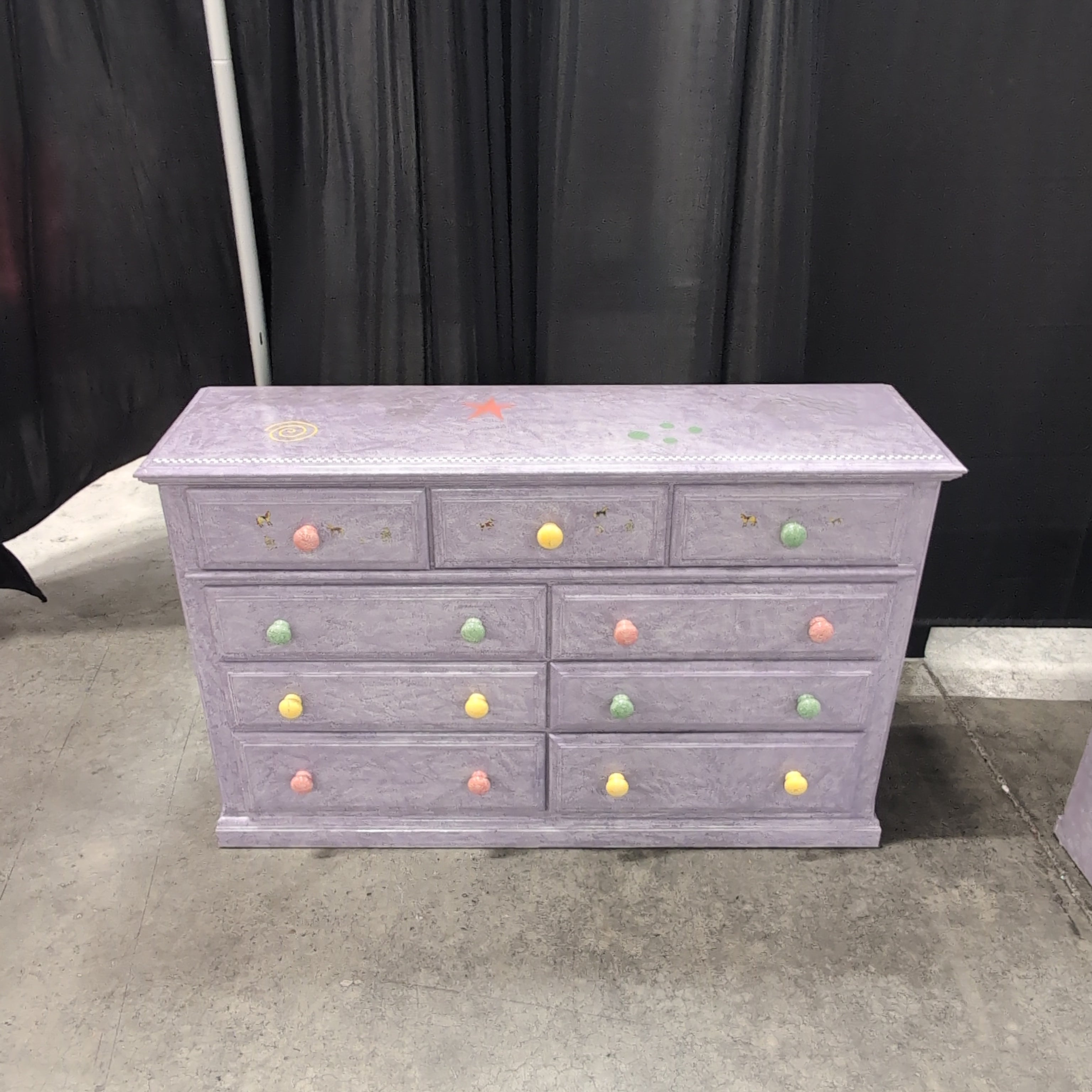 Lavender Nine-Drawer Dresser with Colorful Knobs