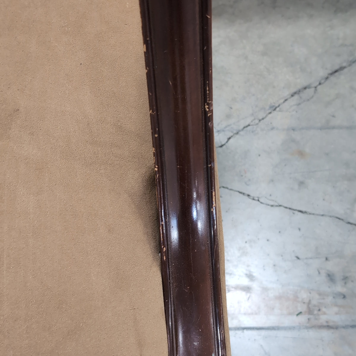Tan Upholstered Arm Chair with Dark Wood Trim