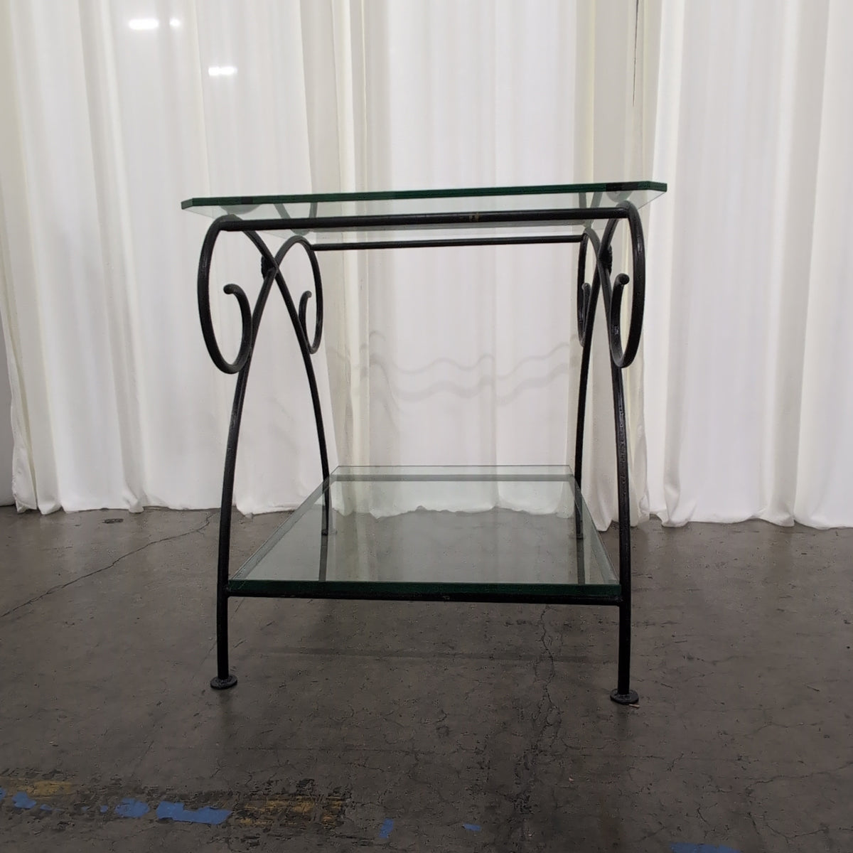 Dark Metal Two-Tiered End Table with Glass Shelves