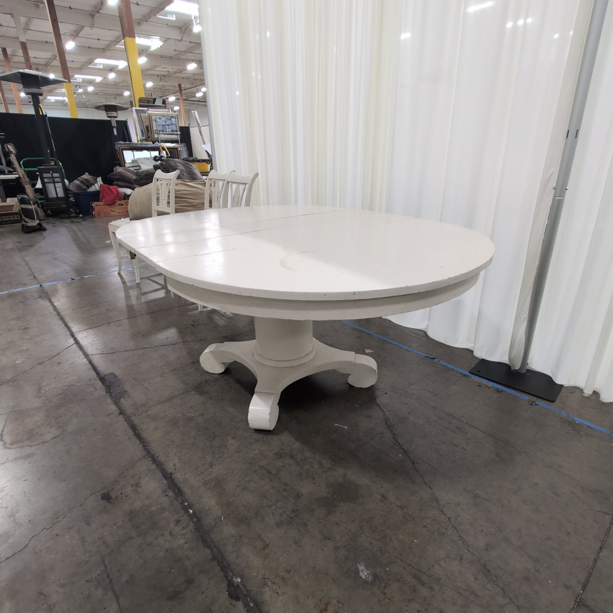White Painted Wood Pedestal Dining Table with Leaves