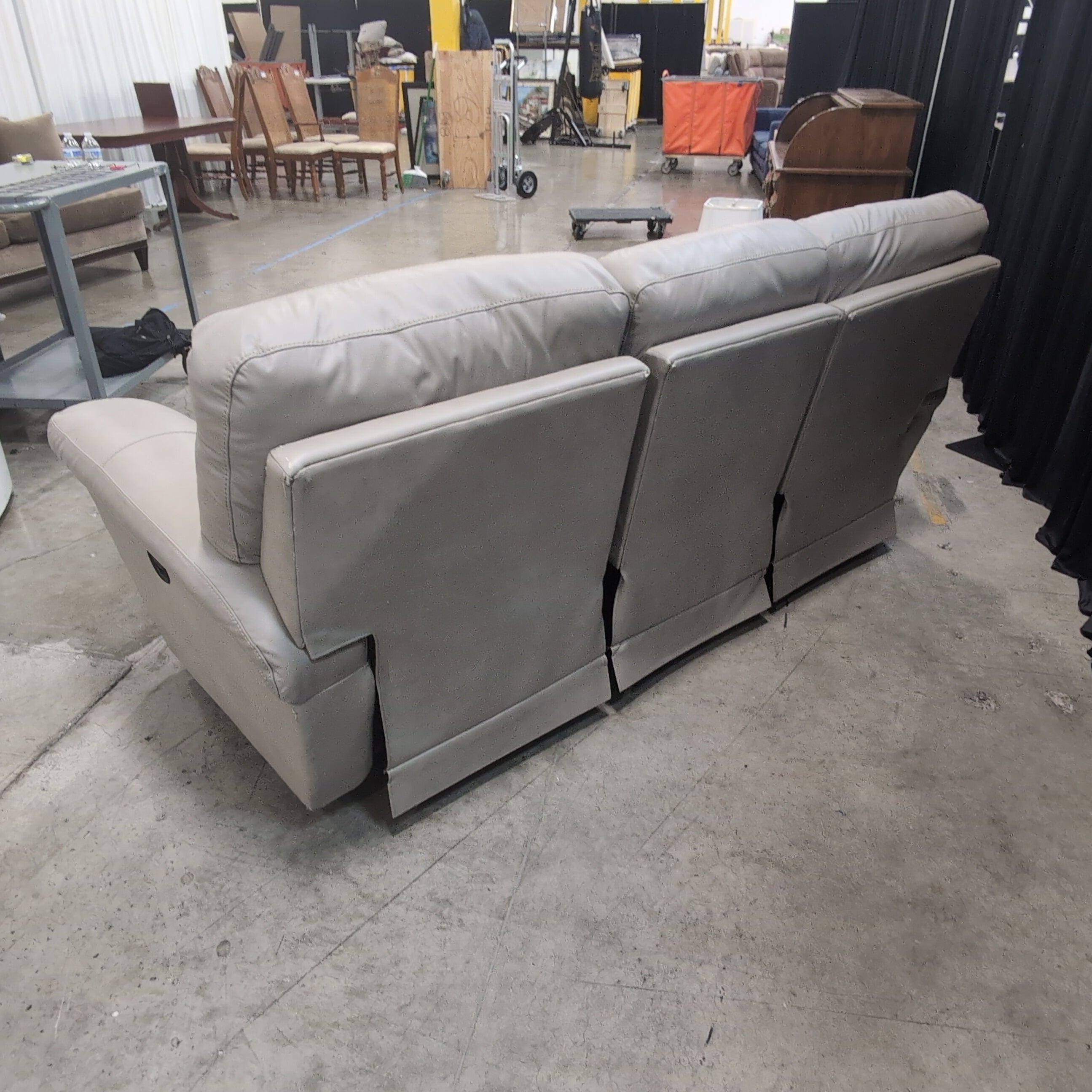 Padded Beige Reclining Three-Seat Couch in Faux Leather