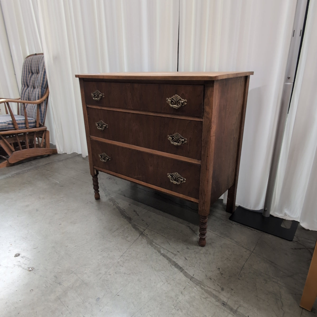 Antique Brown Wood Three-Drawer Dresser with Ornate Hardware