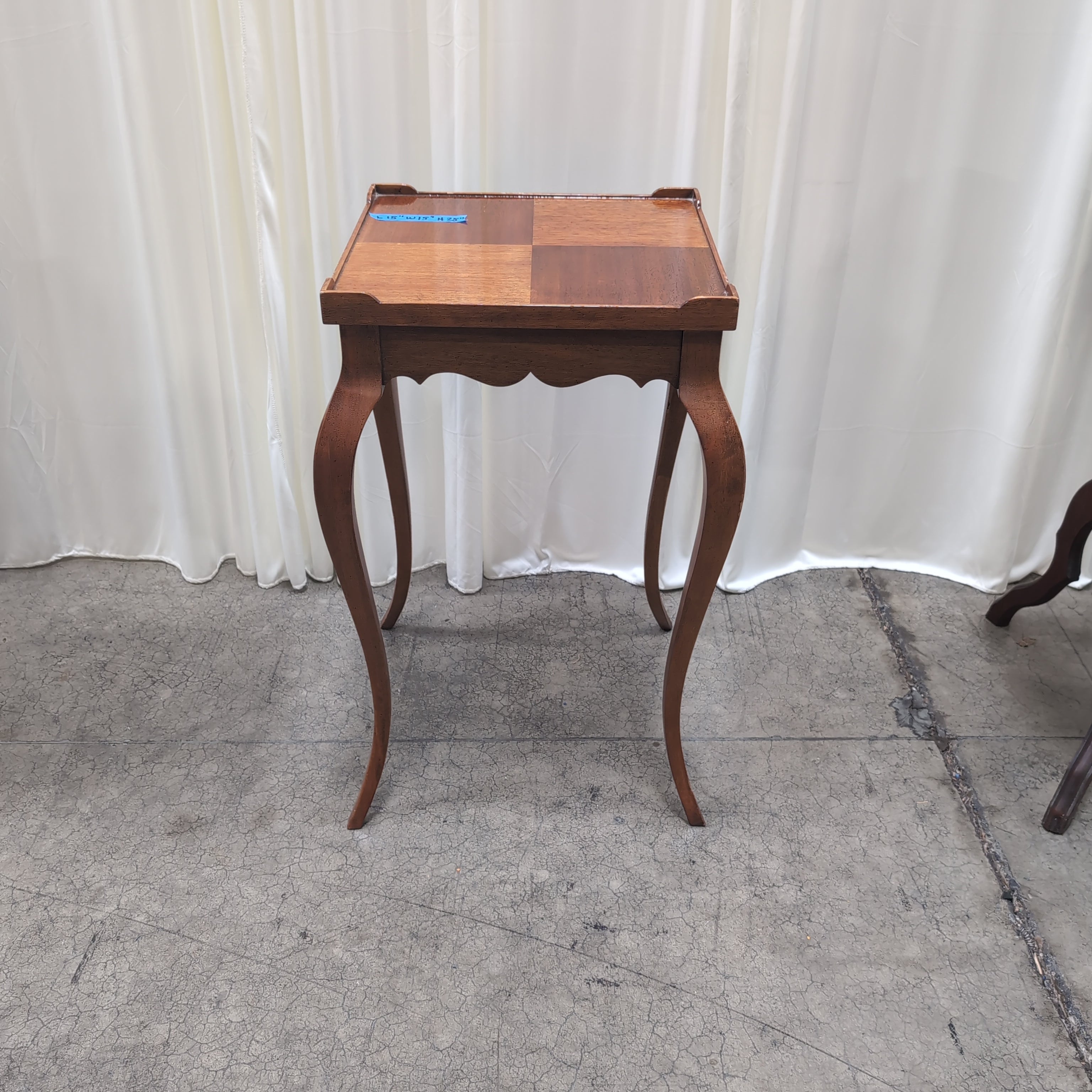 Dark Wood Scalloped End Table with Curved Legs
