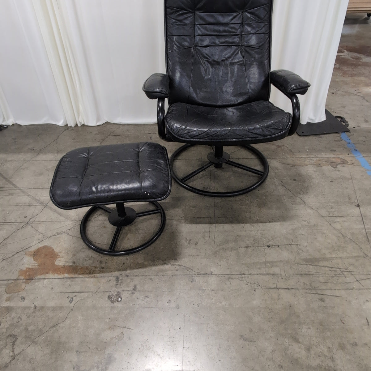 Black Tufted Leather Swivel Recliner with Ottoman