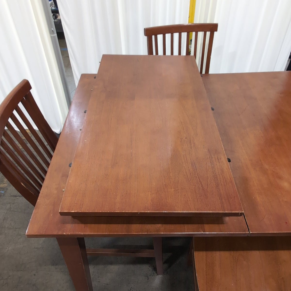 Brown Wood Dining Table and Four Chairs with Slatted Back Chairs