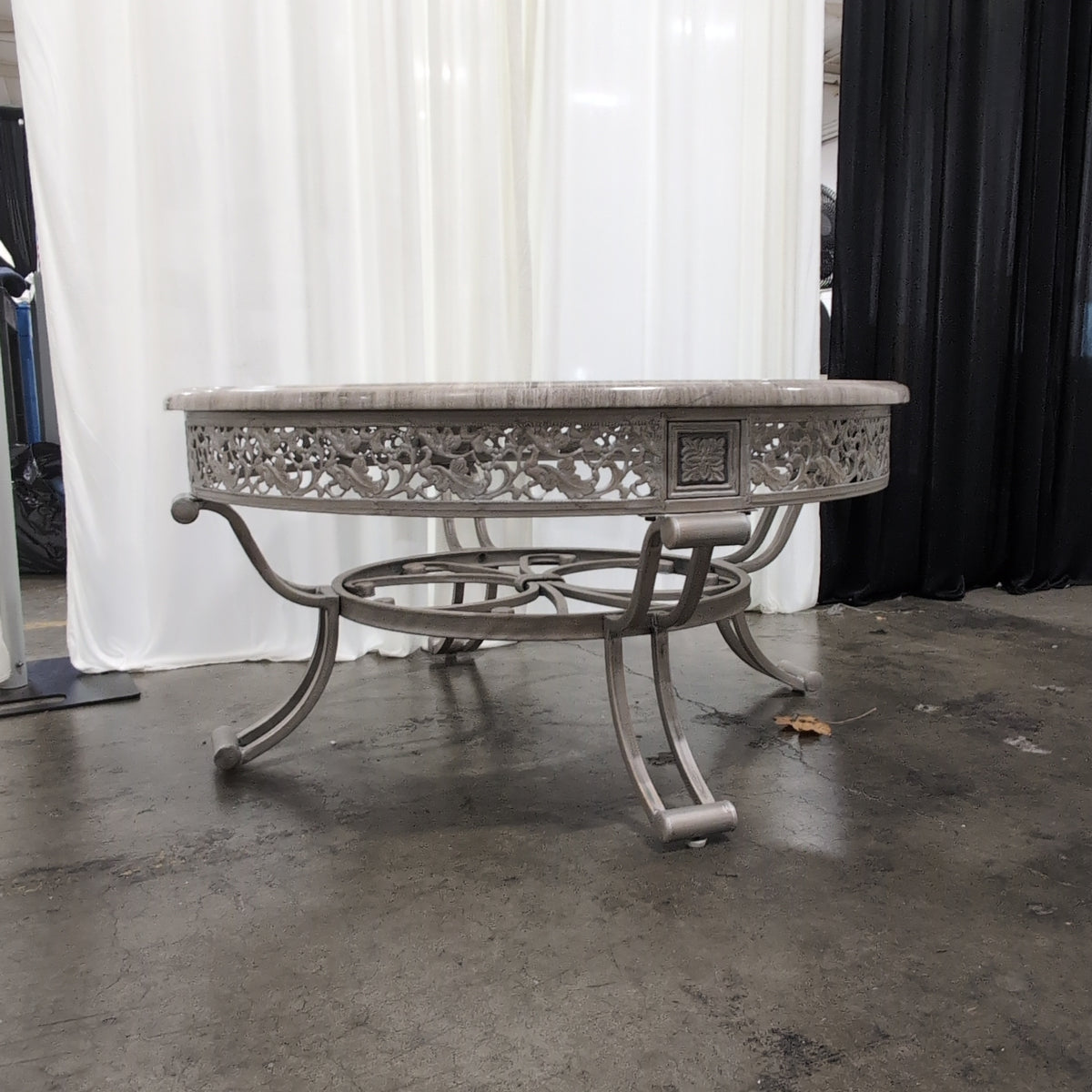 Silver-Toned Ornate Round Coffee Table with Glass Top