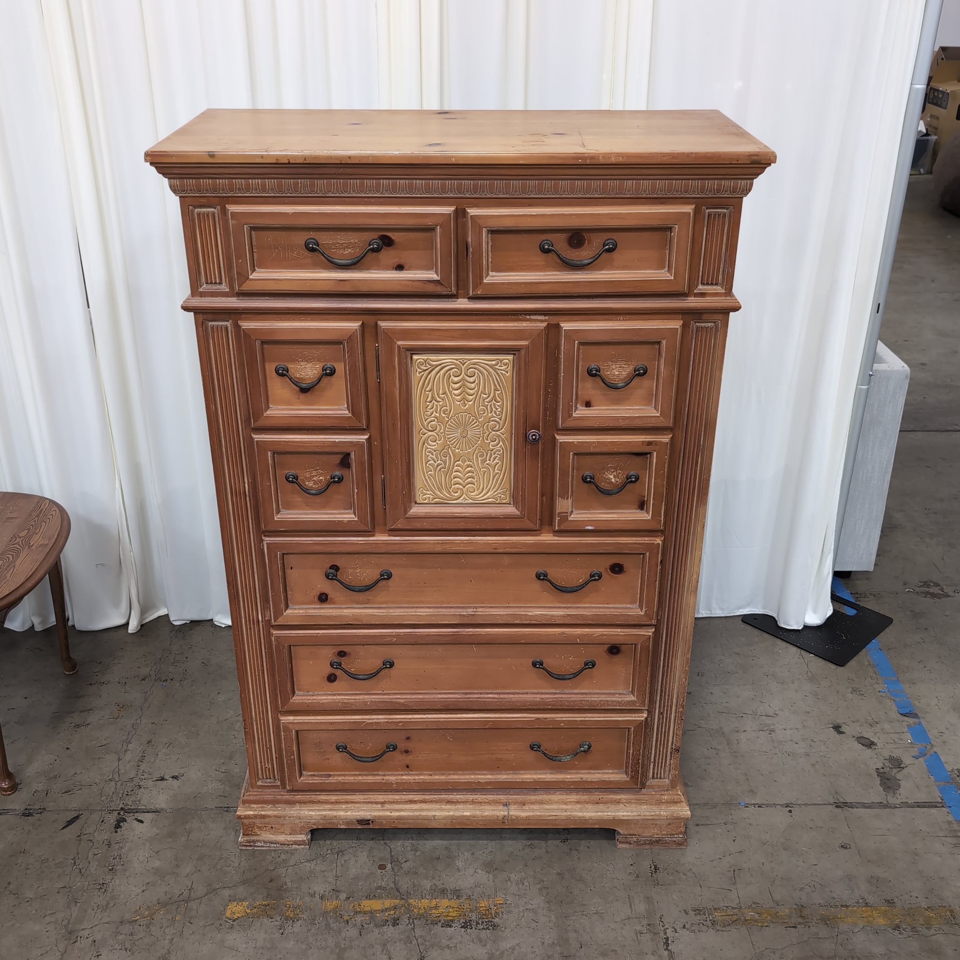 Traditional Carved Wood Dresser with Decorative Panel