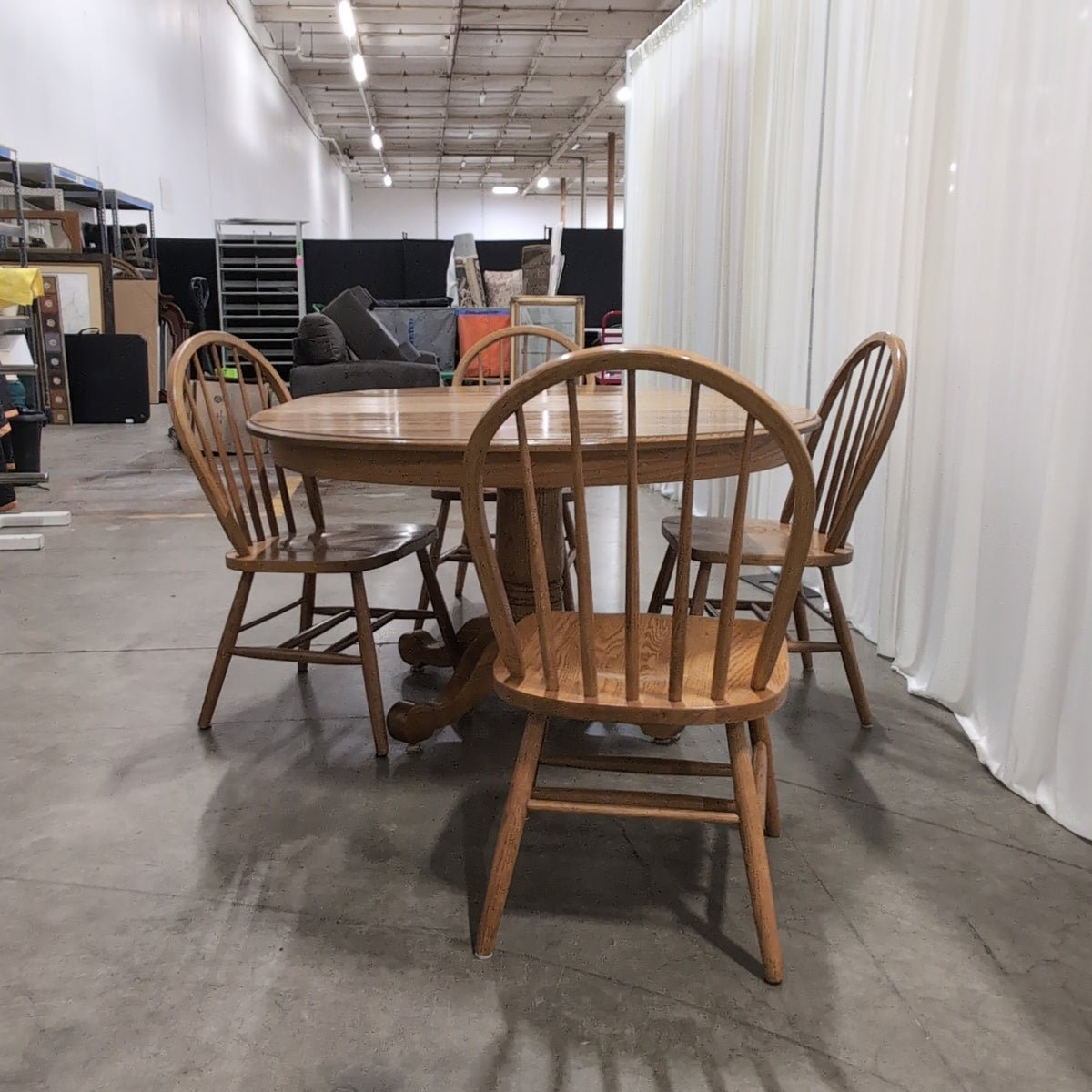 Oval Pedestal Wood Dining Table with Windsor Chairs