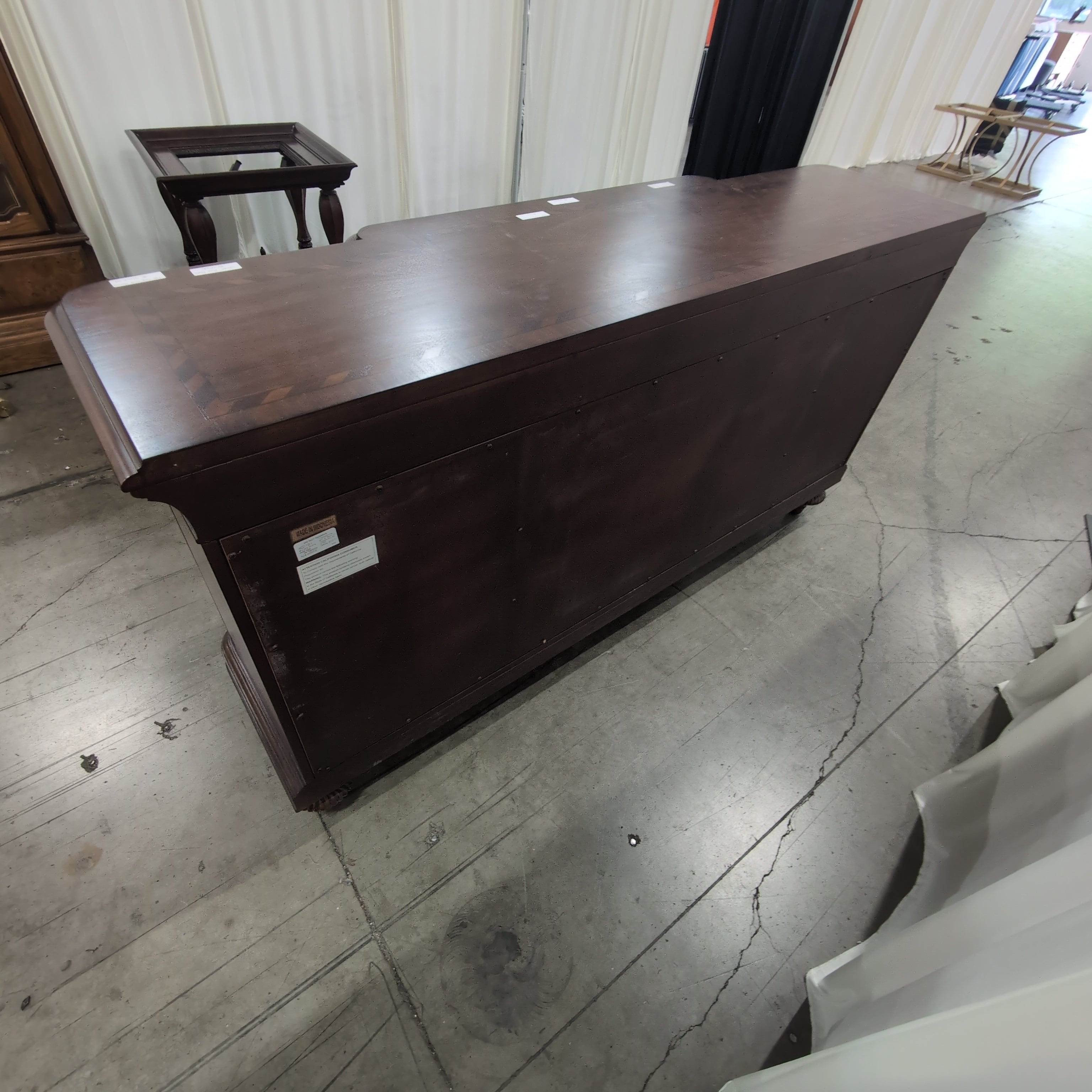 Traditional Dark Wood Buffet with Carved Details