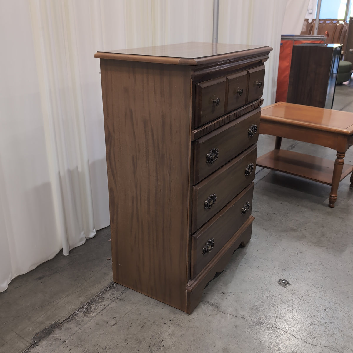 Traditional Warm Wood Five-Drawer Dresser with Ornate Hardware