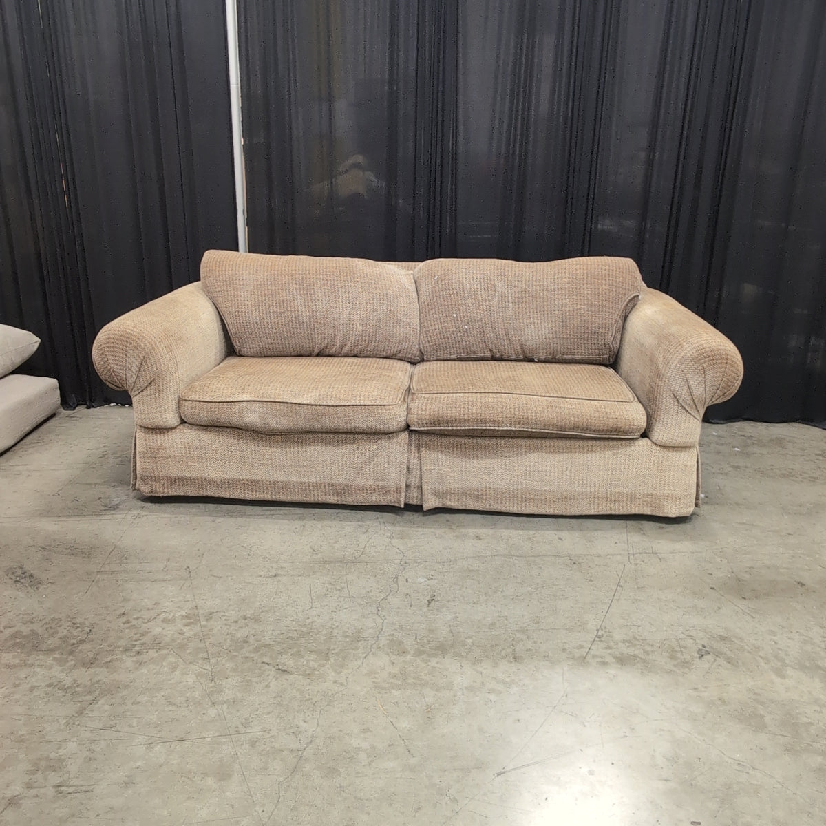 Tan Herringbone Upholstered Rolled Arm Couch with Skirted Base