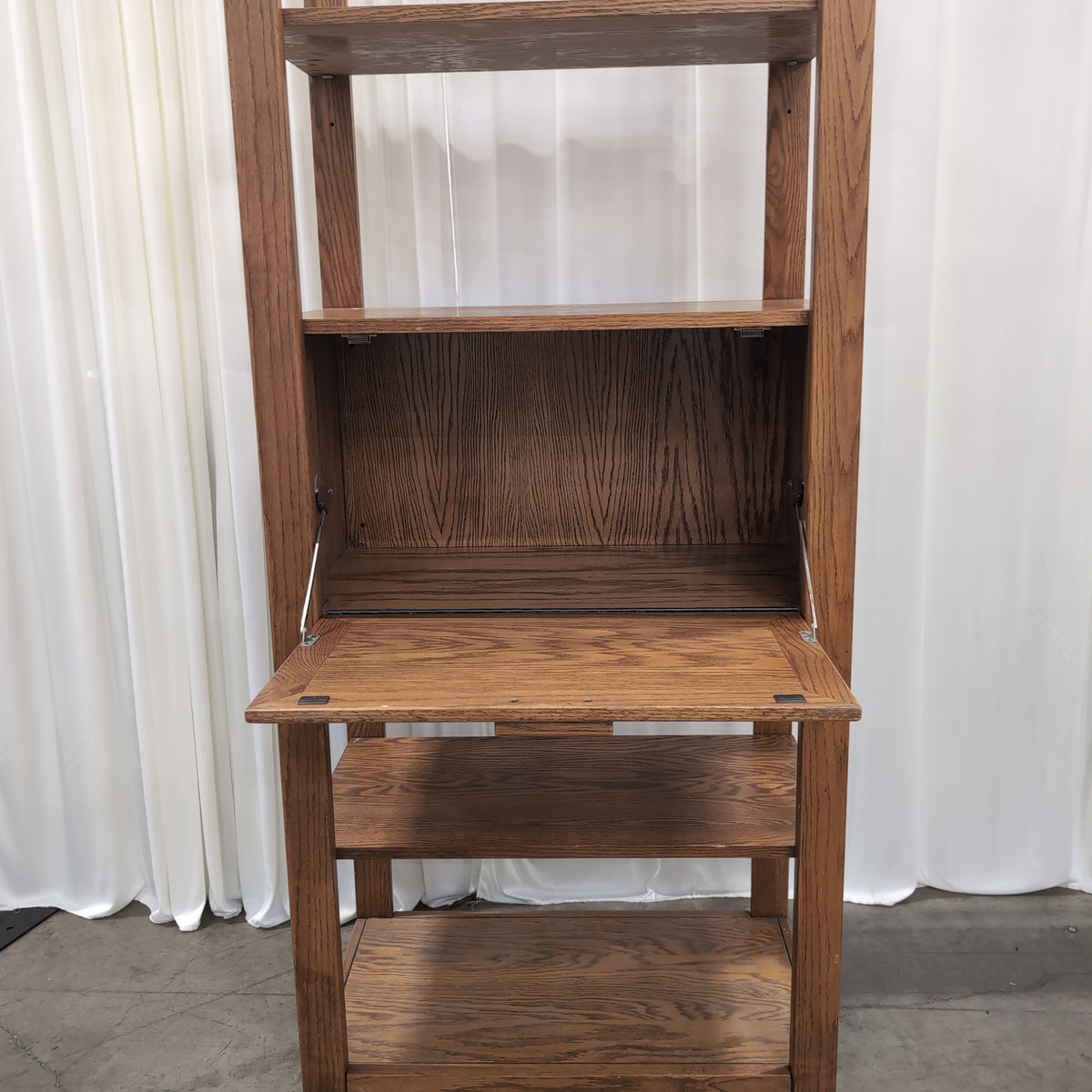 Medium Brown Wood Bookcase with Geometric Cabinet Door