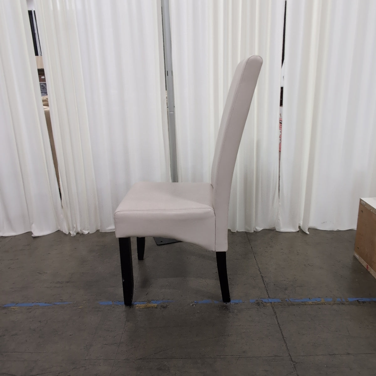 Cream Upholstered High-Back Dining Chair with Dark Legs