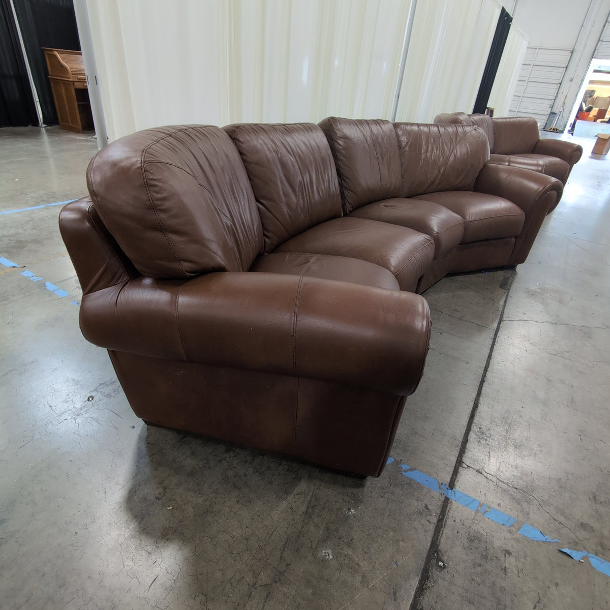 Brown Leather Curved Sectional Couch