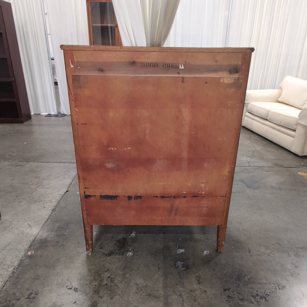 Dark Wood Four-Drawer Dresser with Turned Columns