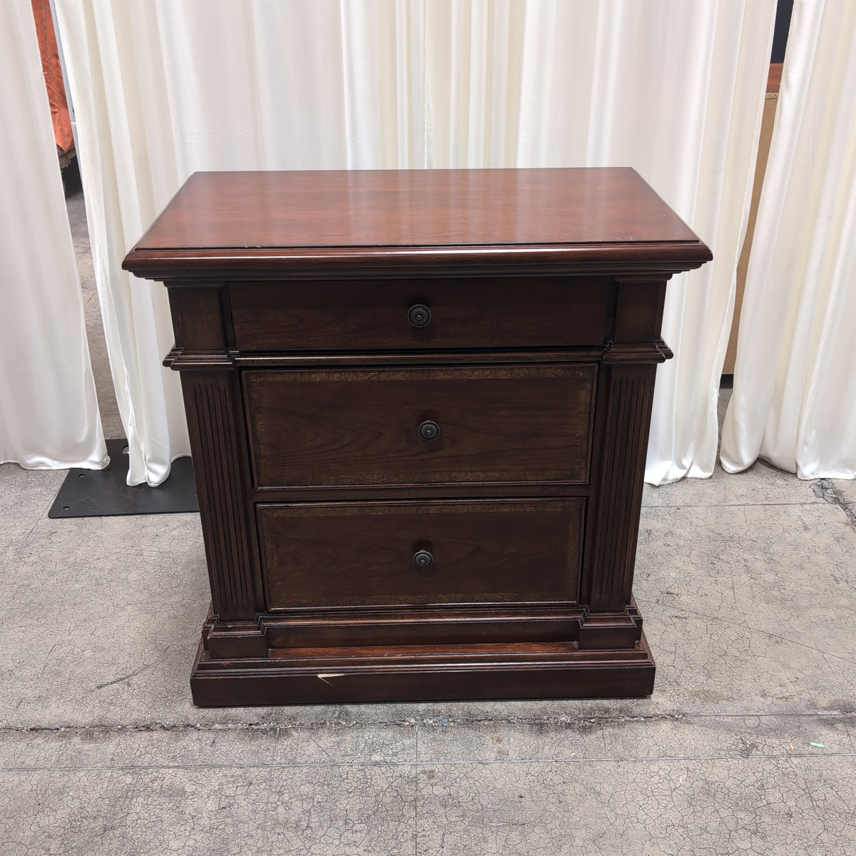 Traditional Dark Wood Three-Drawer Nightstand