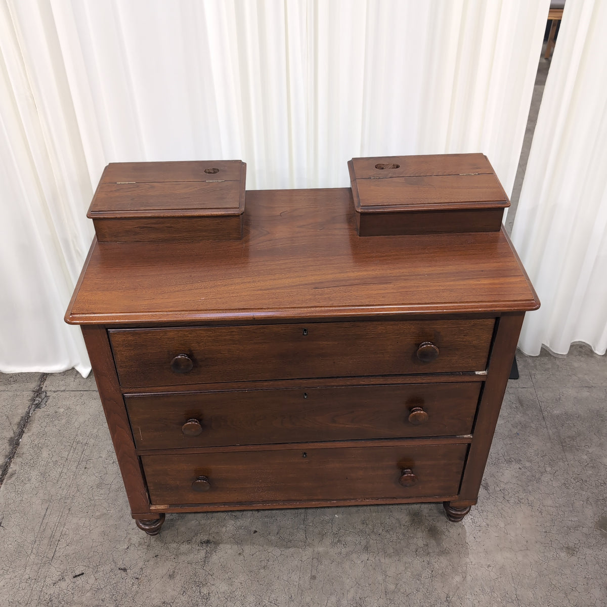 Traditional Reddish-Brown Wood Nightstand with Three Drawers