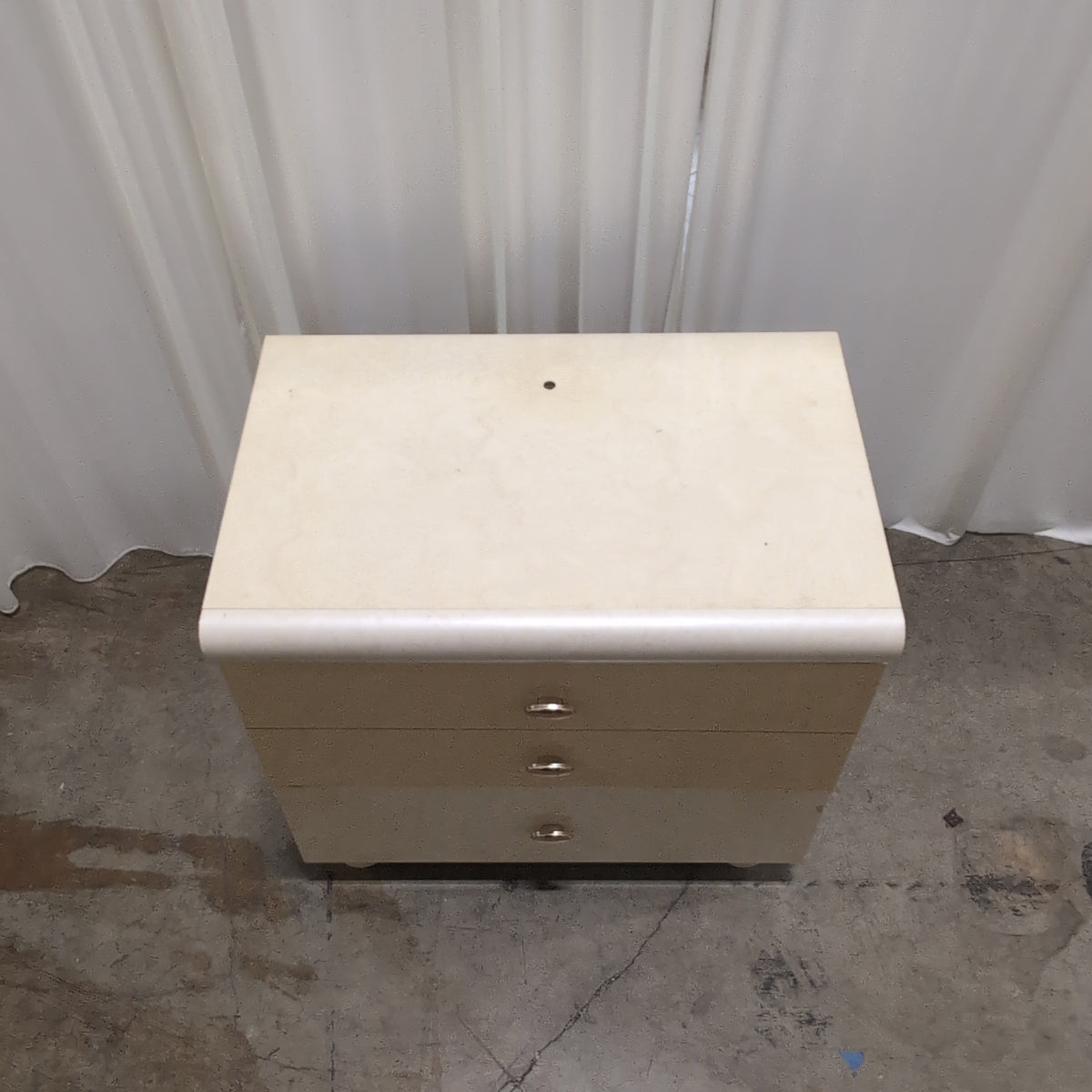 Light Burlwood Pattern Three-Drawer Nightstand with Gold Pulls