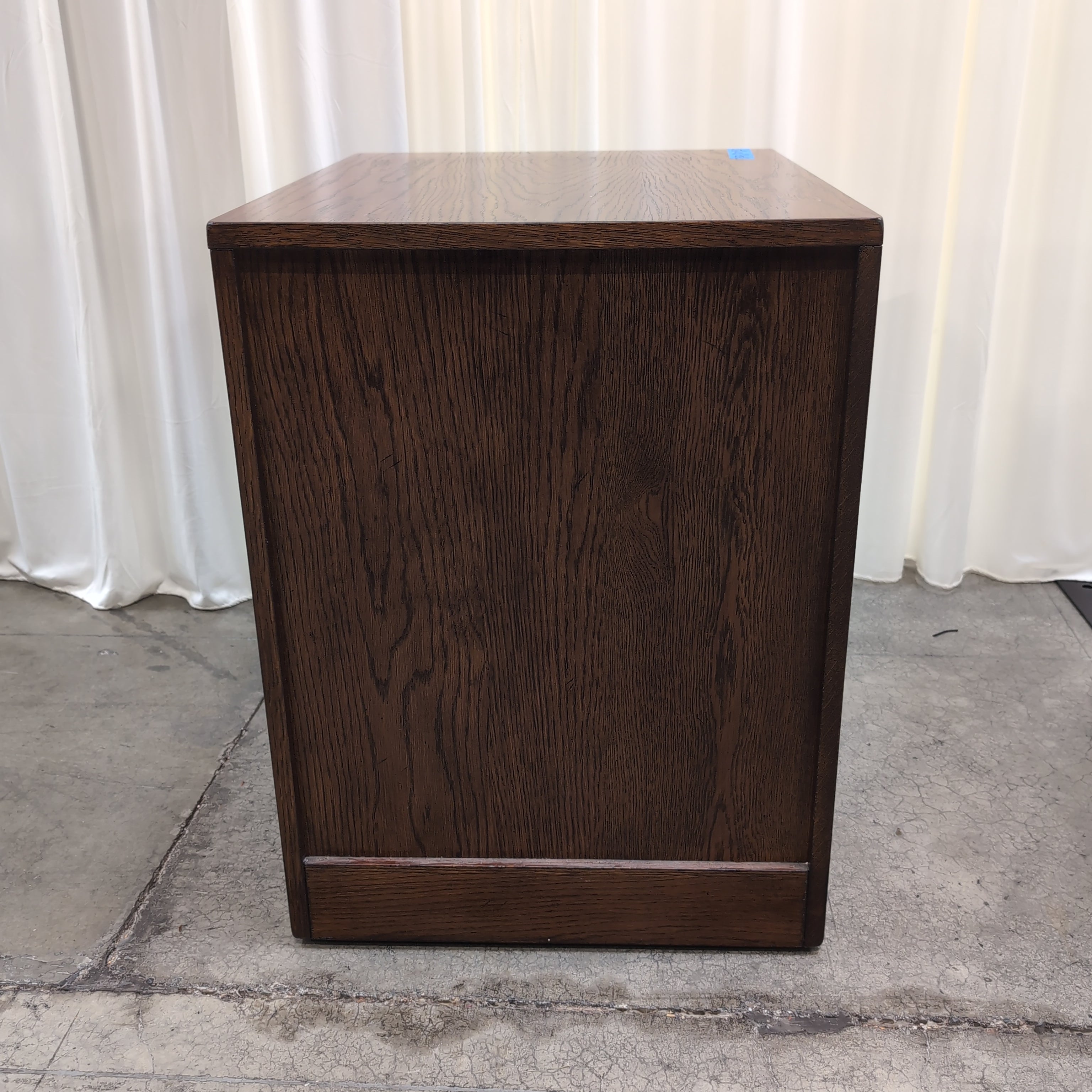Brown Stained Hardwood Three-Drawer Nightstand with Black Hardware