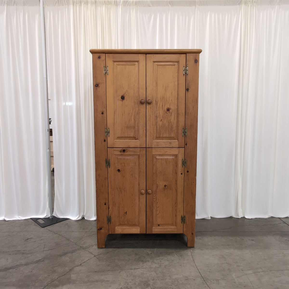 Rustic Pine Four-Door Pantry Cabinet in Natural Wood